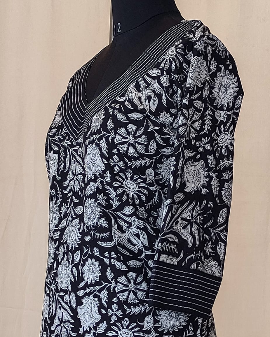 172 Black and white printed kurta with detailing on neck and sleeves