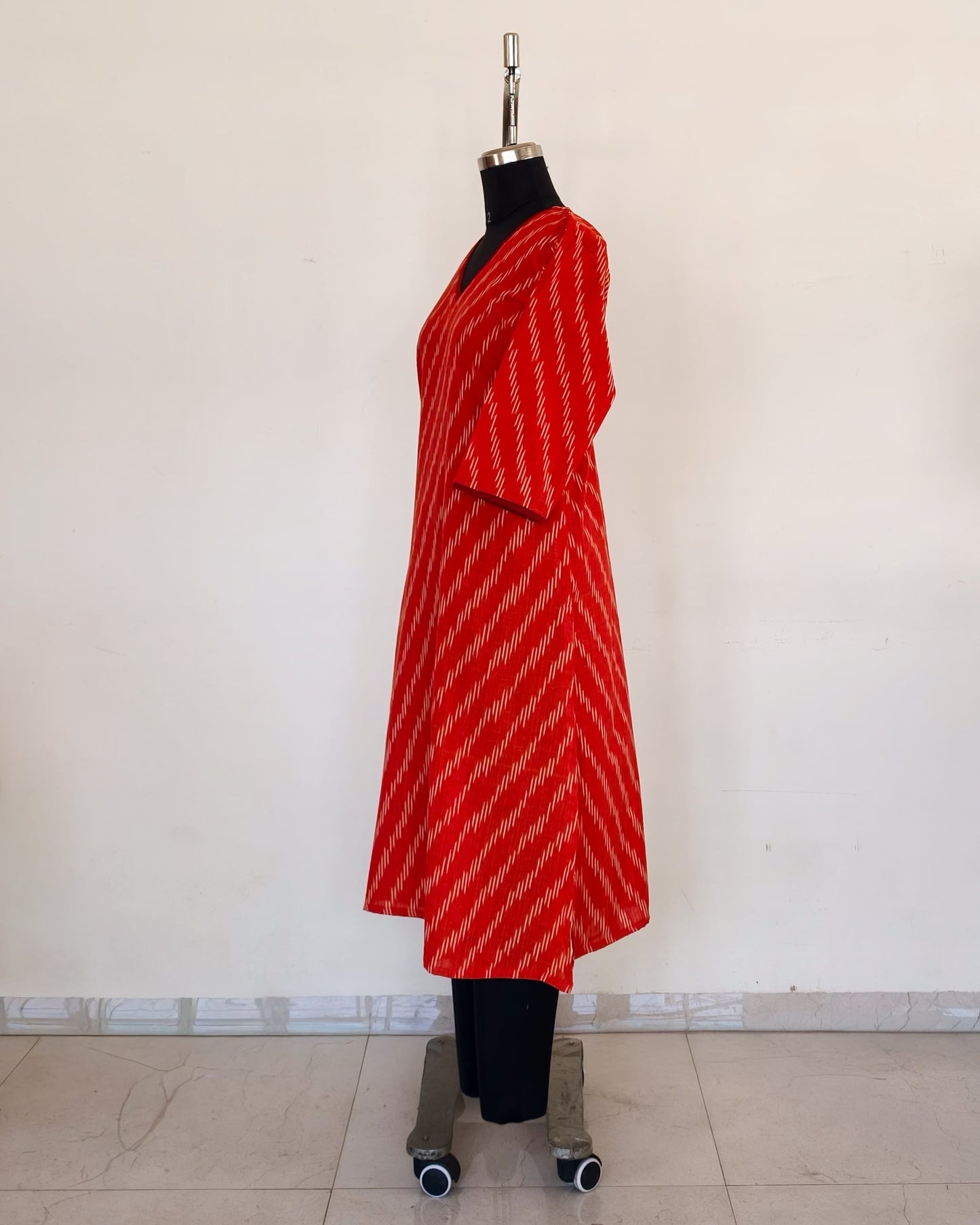 275 Orange ikkat with Maroon neck details
