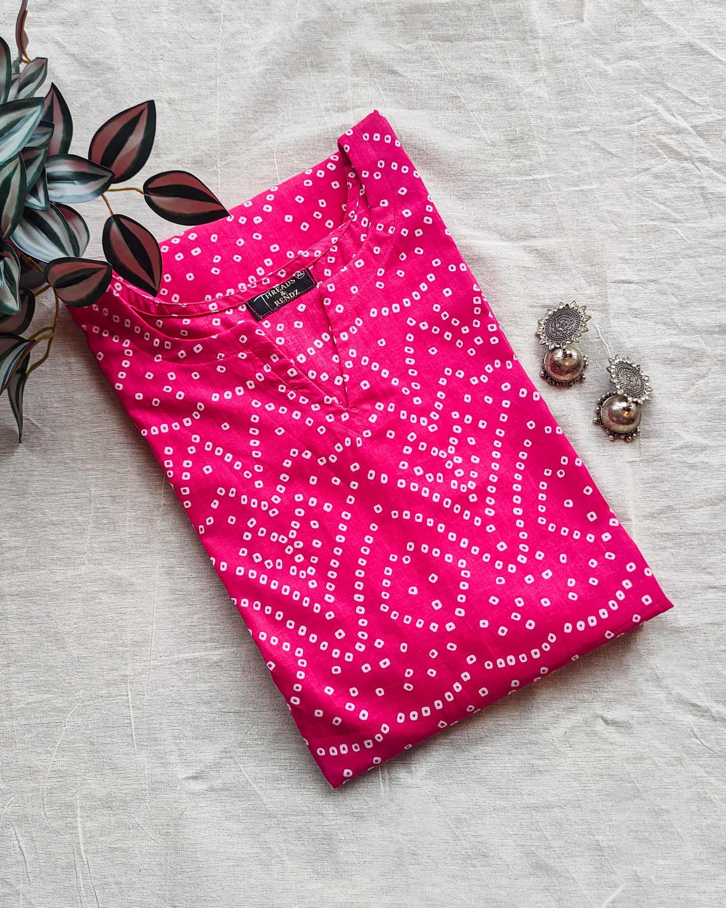 155 Pink bandhani print fit n flare kurta with chudi sleeves