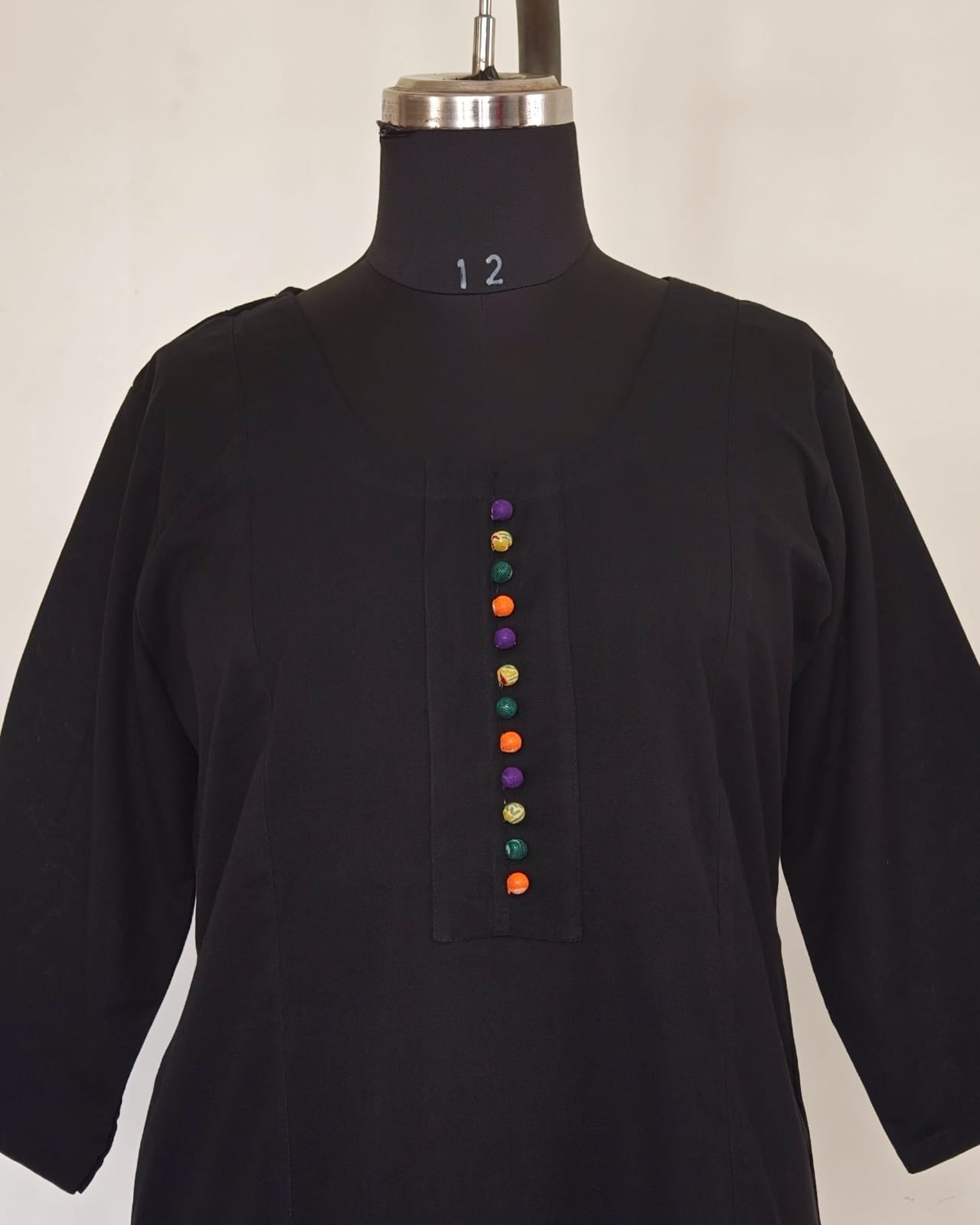 247 Black flare kurta with multicoloured Potlis