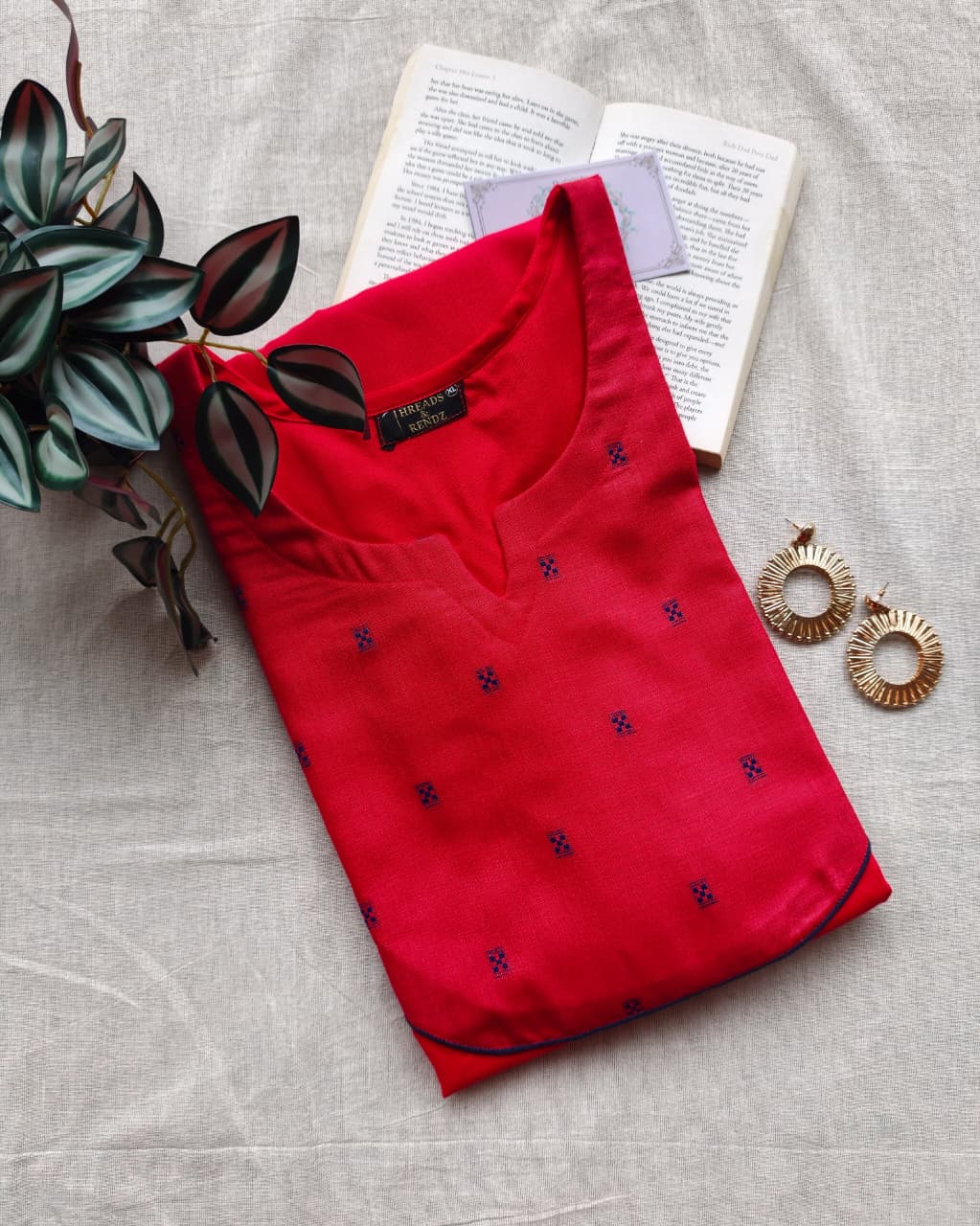 302 Red A-line kurta with navy blue butta yoke patch