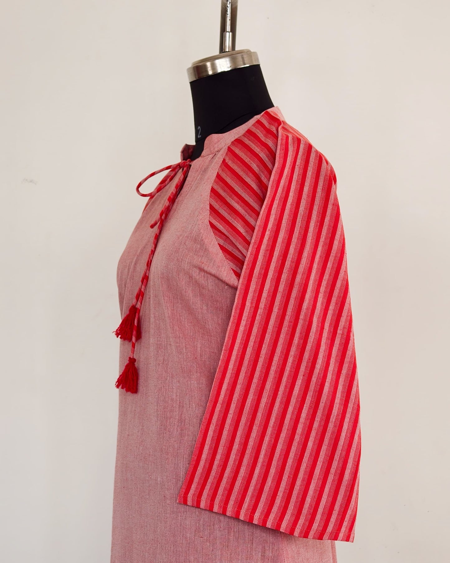 267 Pink with stripes sleeves and tassels