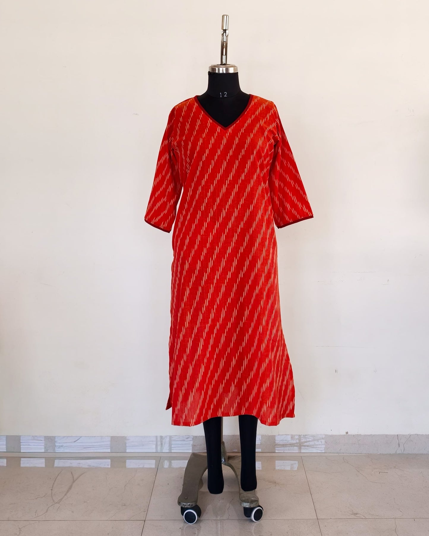 275 Orange ikkat with Maroon neck details