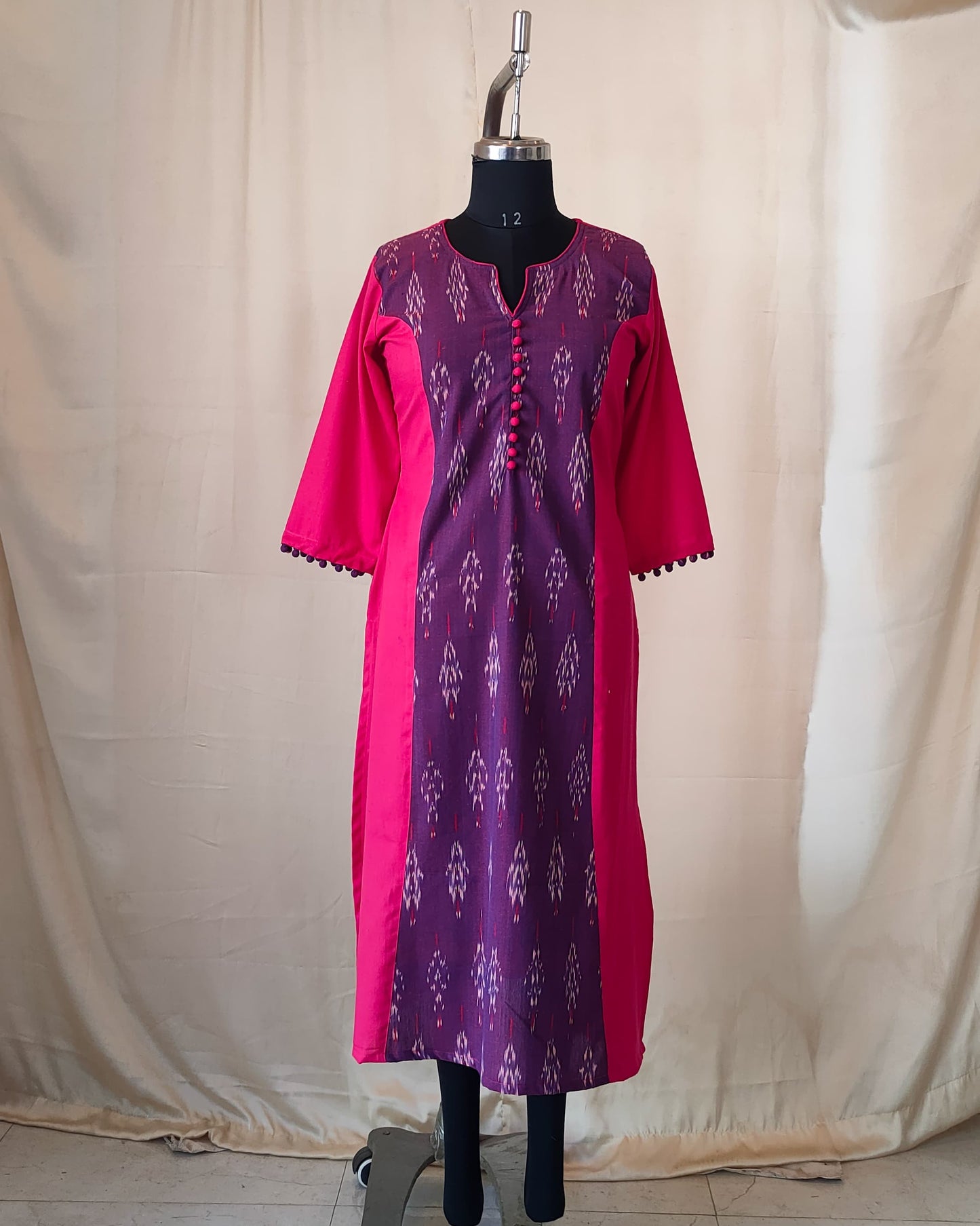 209	Pink n purple ikkat princess cut kurta with potlis
