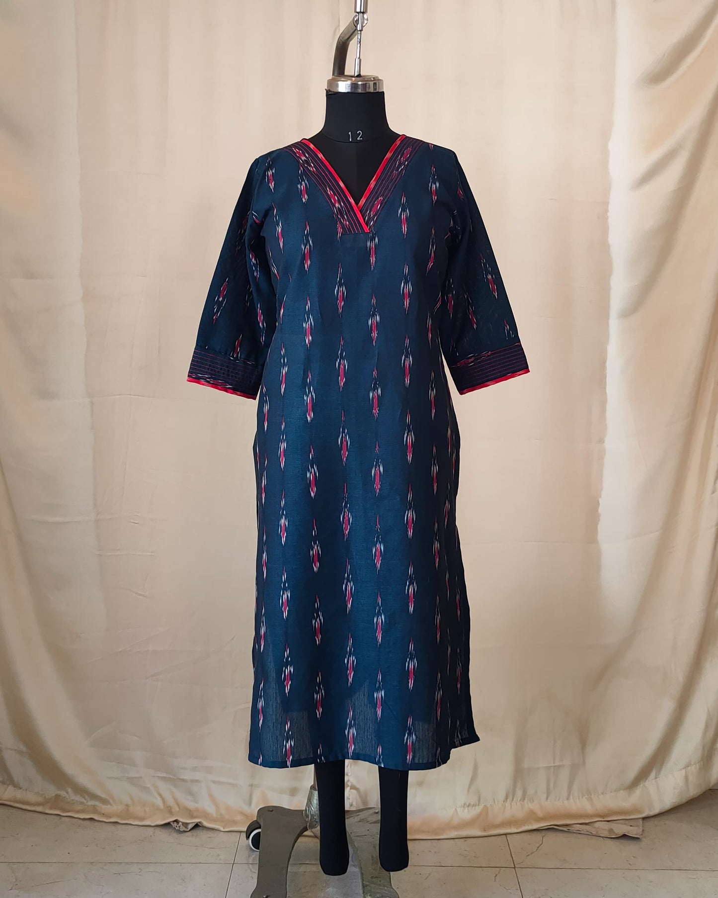 208	Navy blue ikkat kurta with red detailing