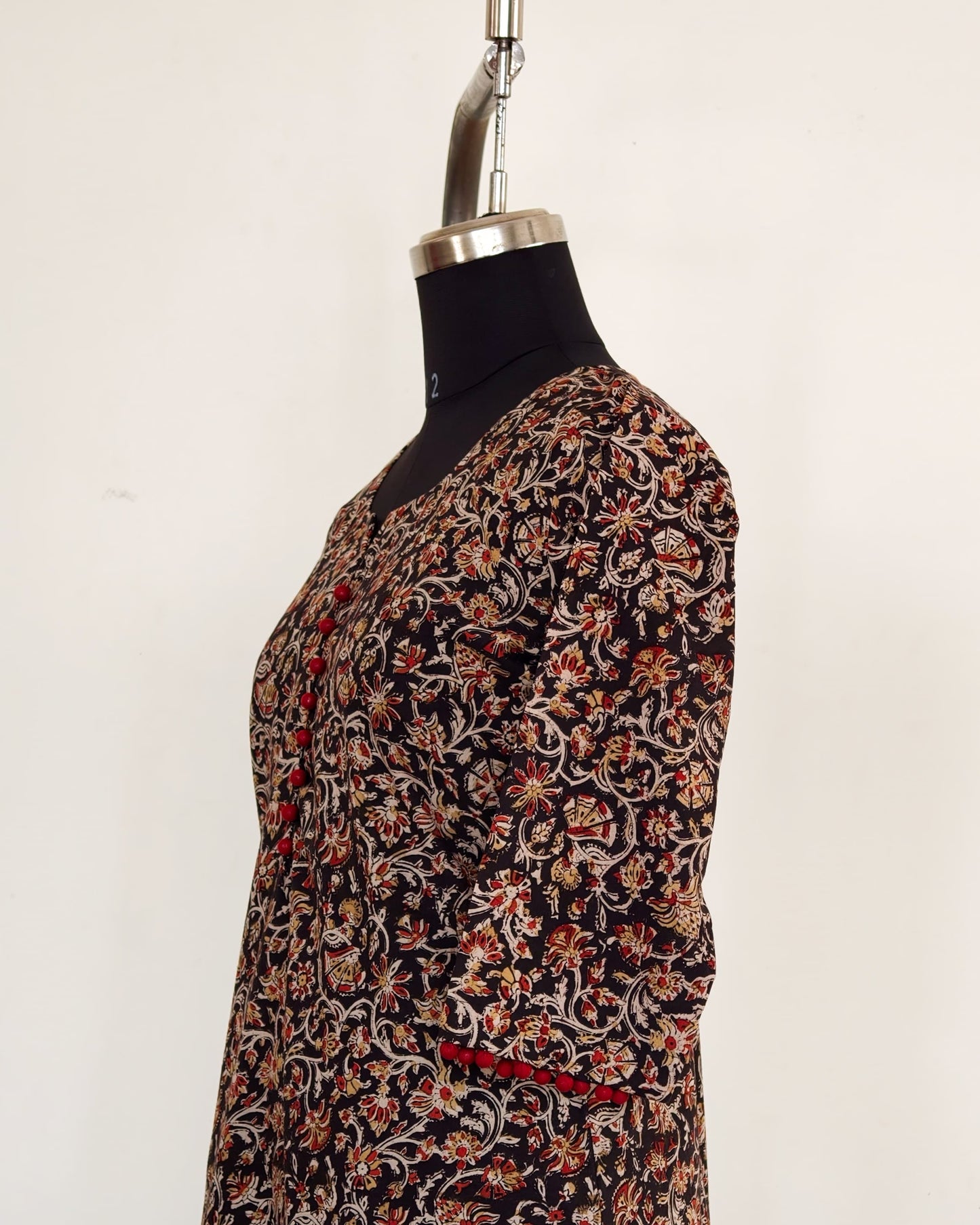 269 Black and maroon kalamkari with maroon potlis