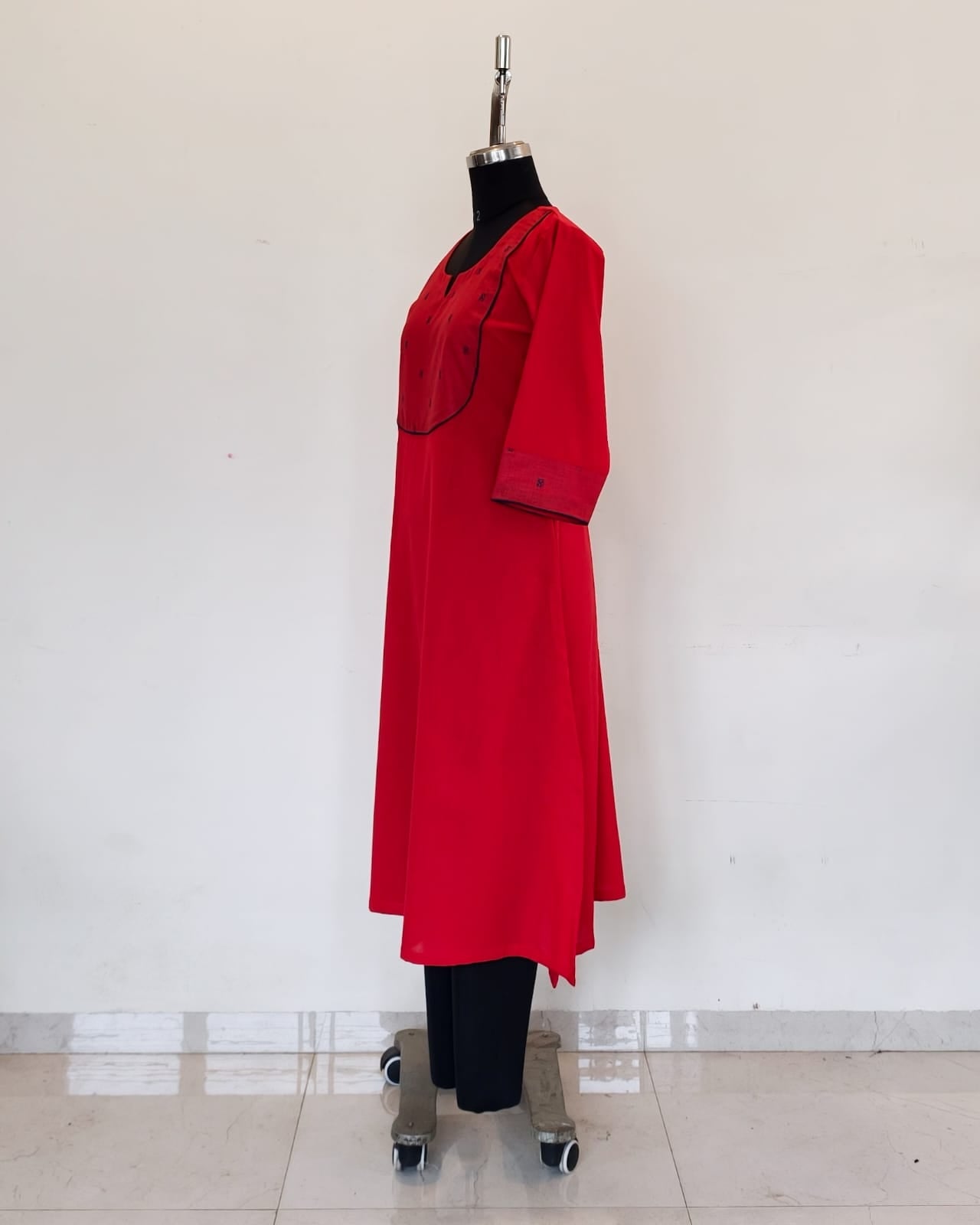 302 Red A-line kurta with navy blue butta yoke patch