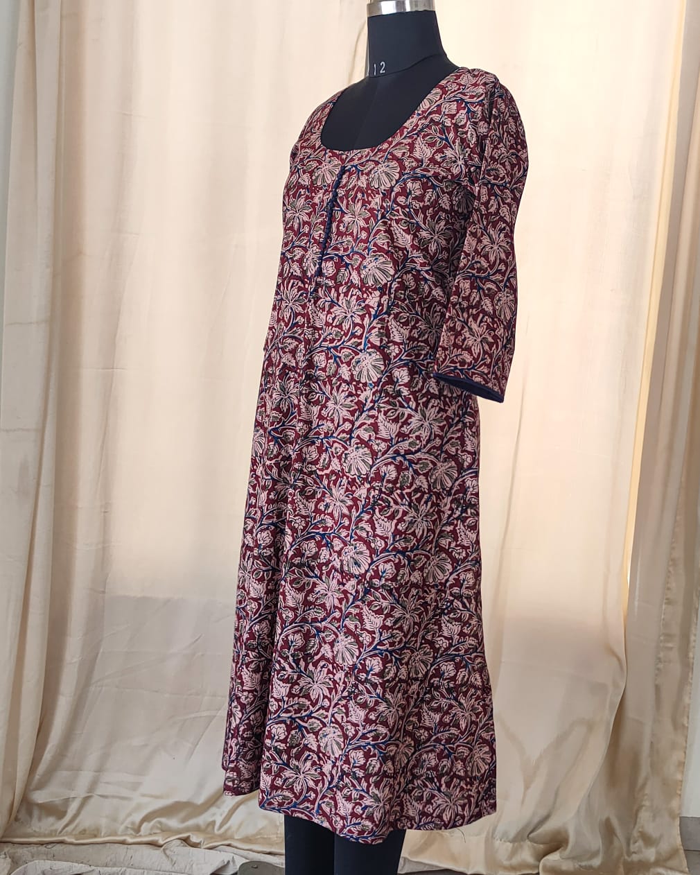 140 A Maroon kalamkari A-line Kurta with blue potlis