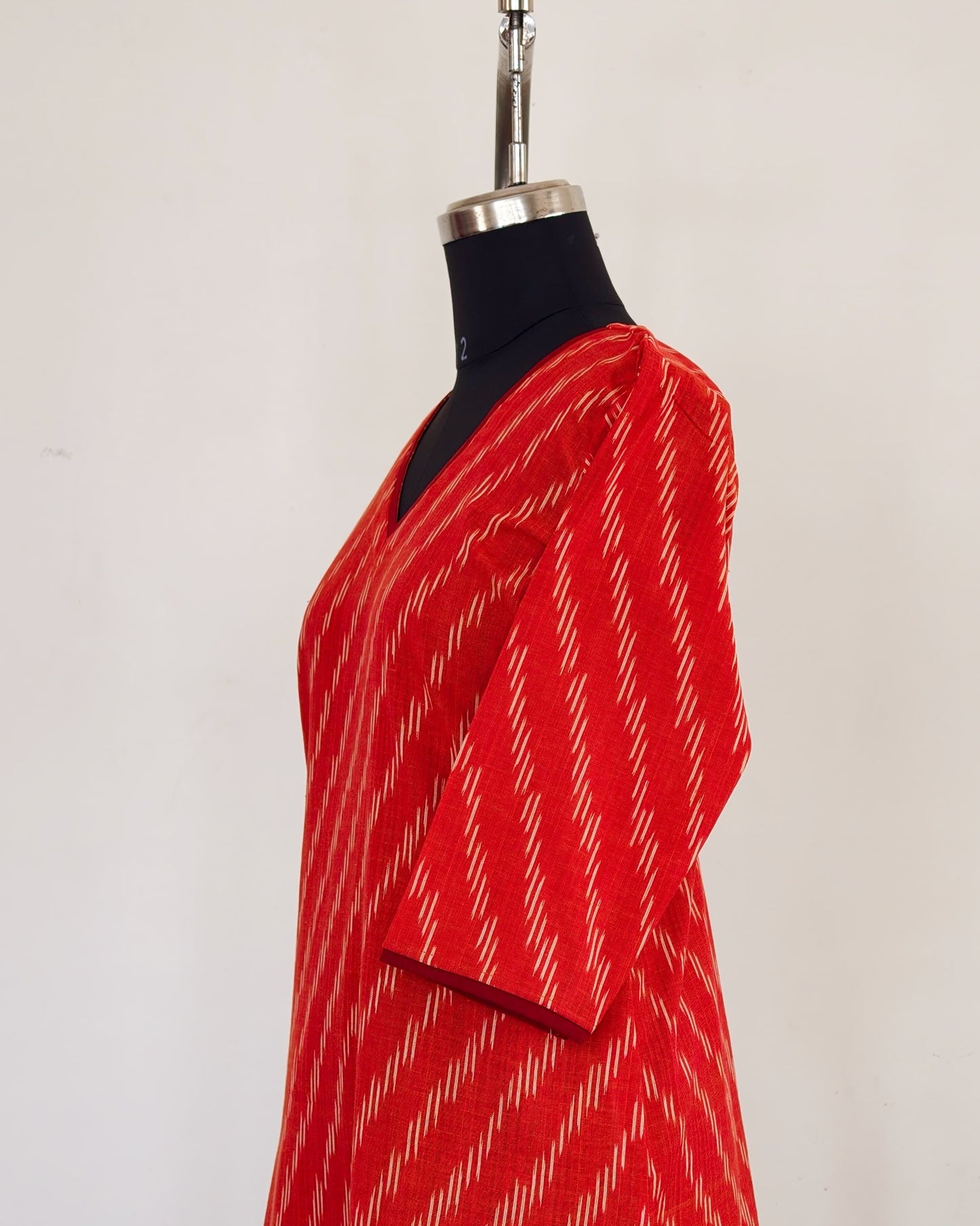 275 Orange ikkat with Maroon neck details