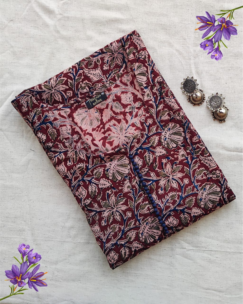 140 A Maroon kalamkari A-line Kurta with blue potlis