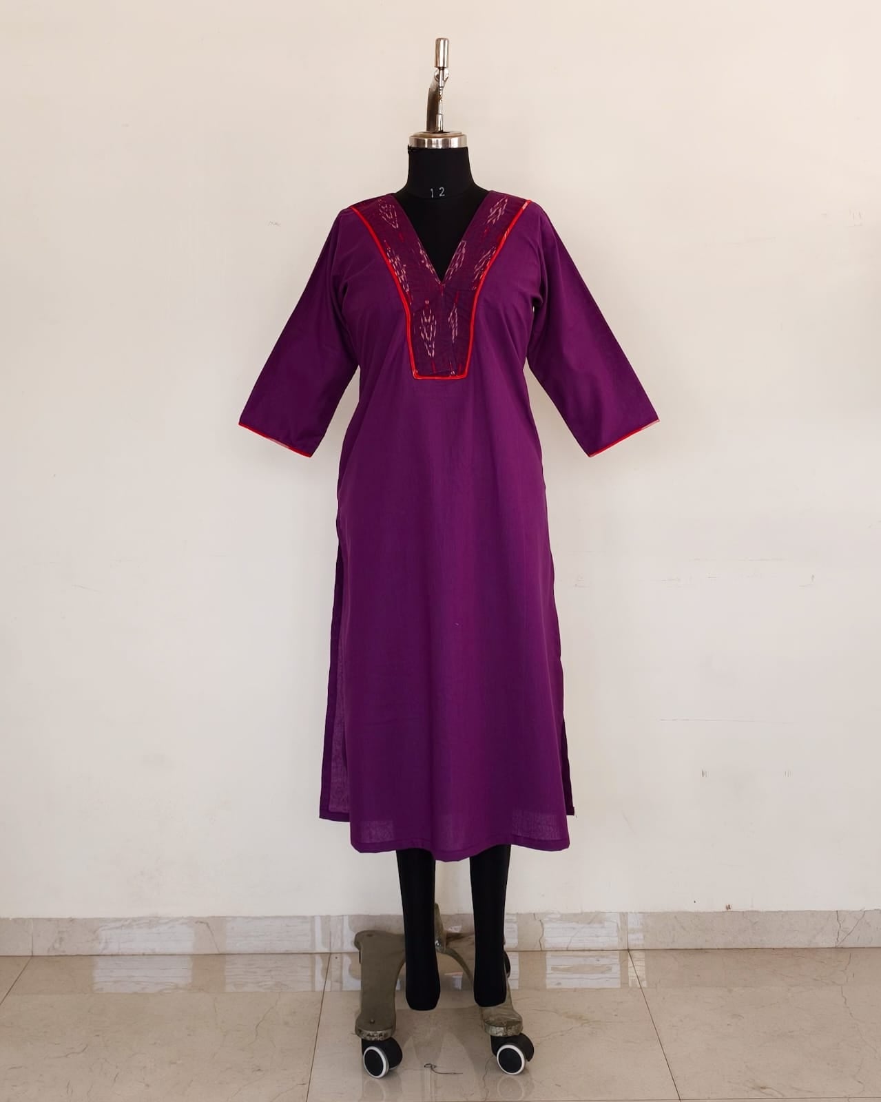 291 Purple with ikkat patch and red piping