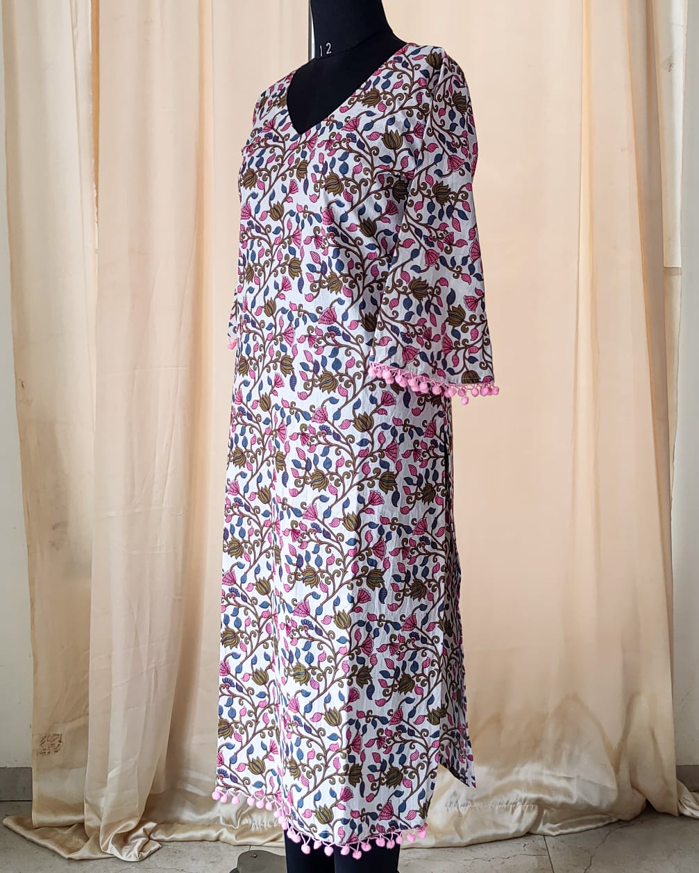 135 White Printed kurta with Pom-pom lace and bell sleeves
