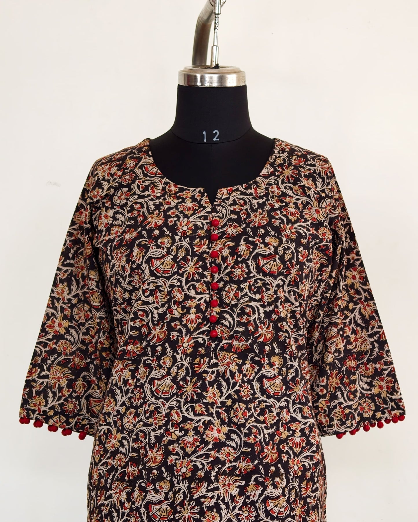 269 Black and maroon kalamkari with maroon potlis