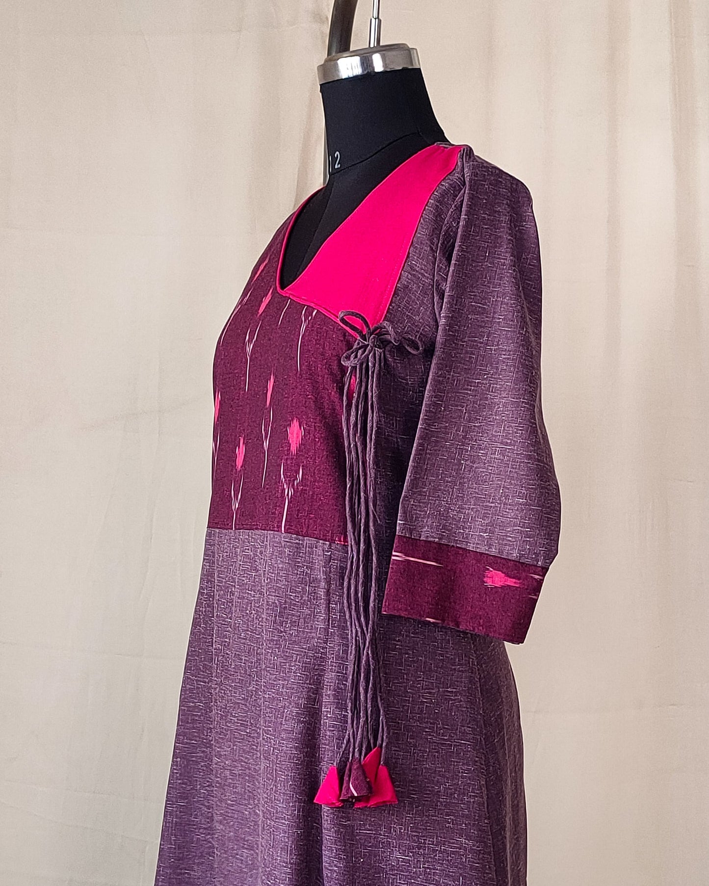 203	Purple soft cotton kurta with ikkat overlap pattern and tassels