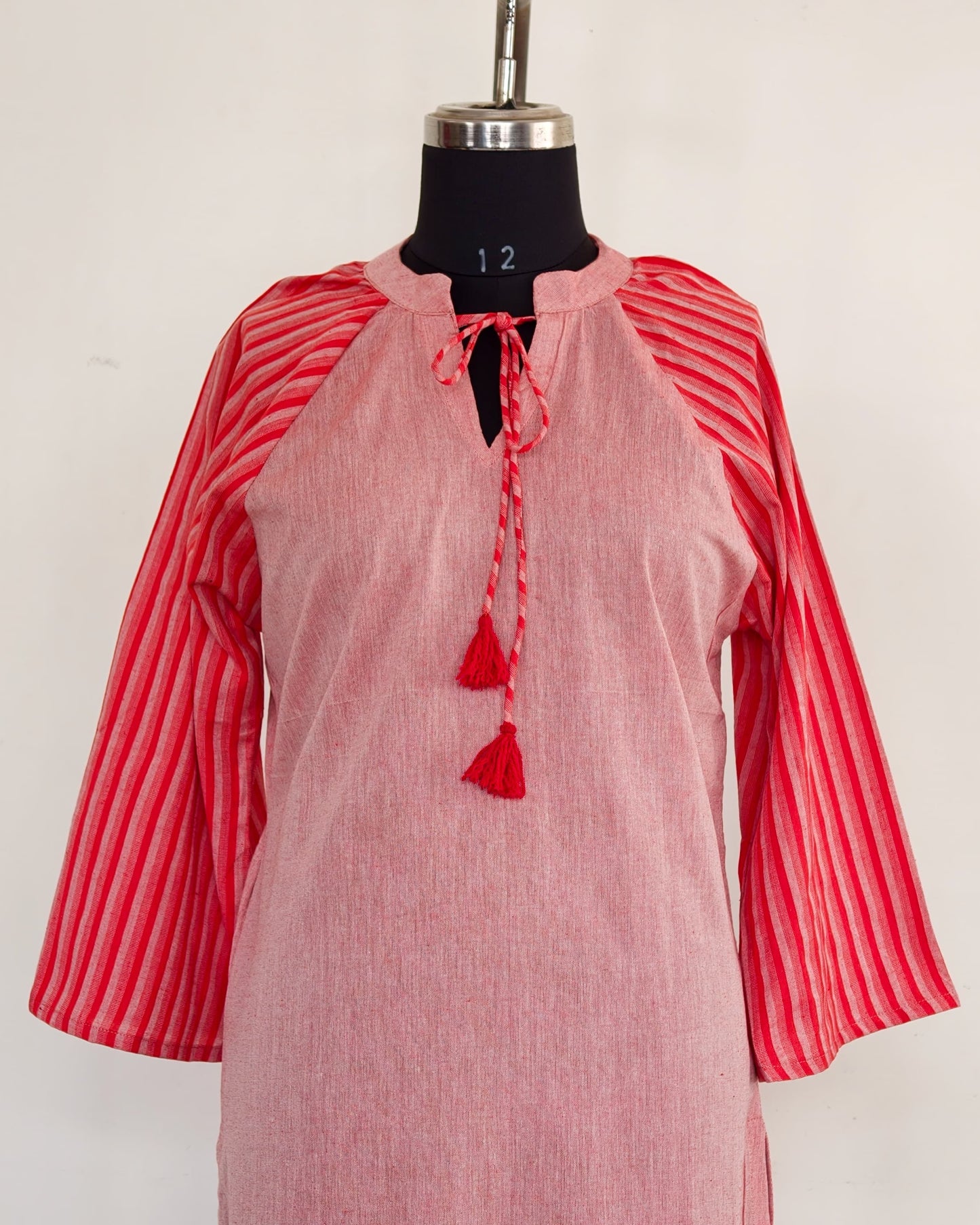 267 Pink with stripes sleeves and tassels