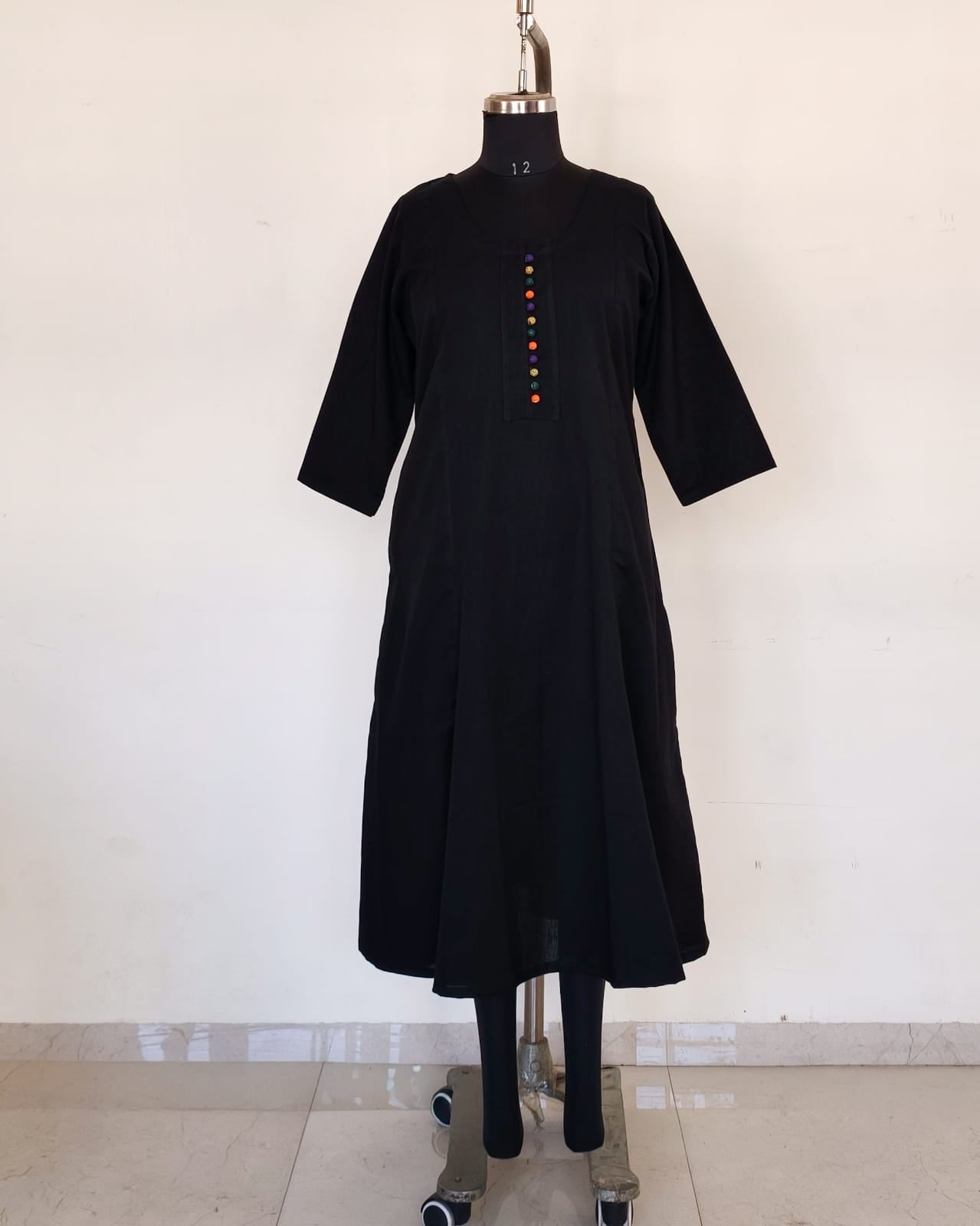 247 Black flare kurta with multicoloured Potlis