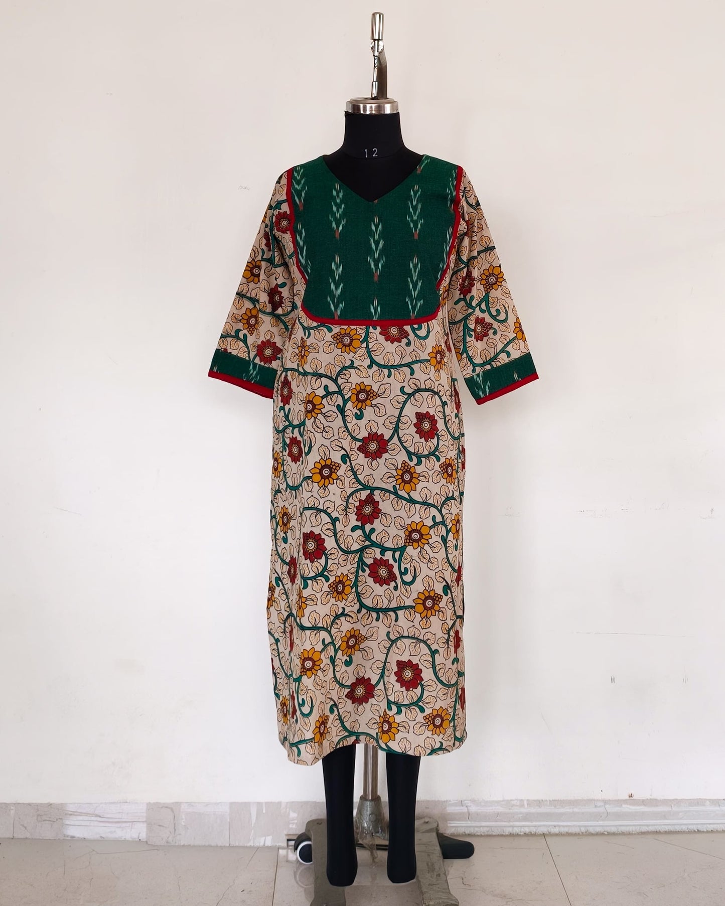 235 Cream floral kalamkari kurta with green ikkat yoke patch