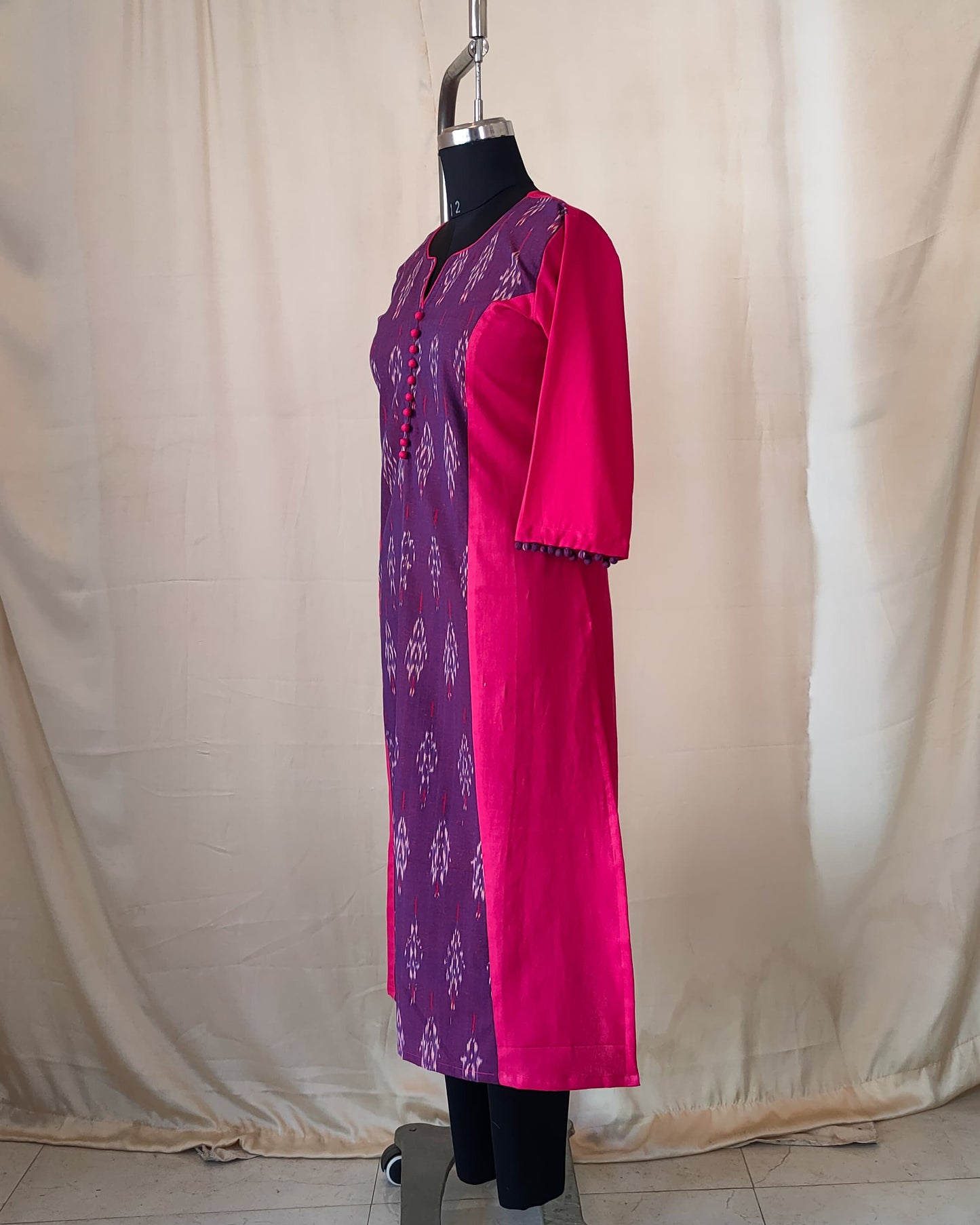 209	Pink n purple ikkat princess cut kurta with potlis