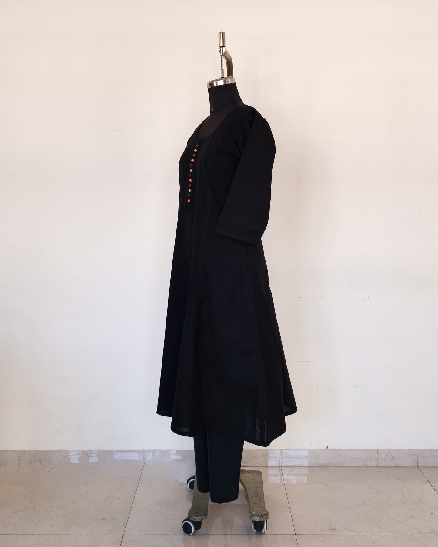 247 Black flare kurta with multicoloured Potlis
