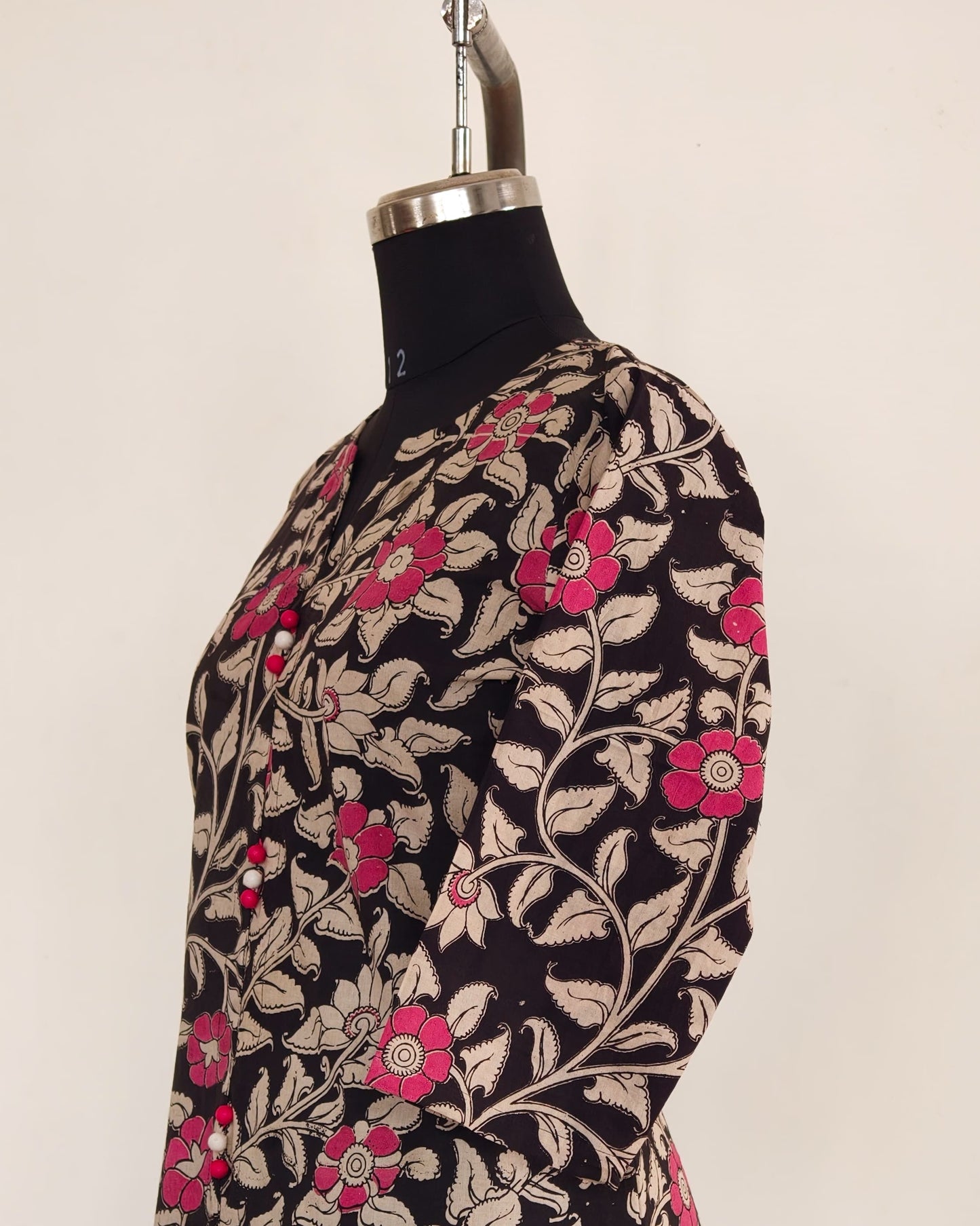 239 Black kalamkari kurta with potlis