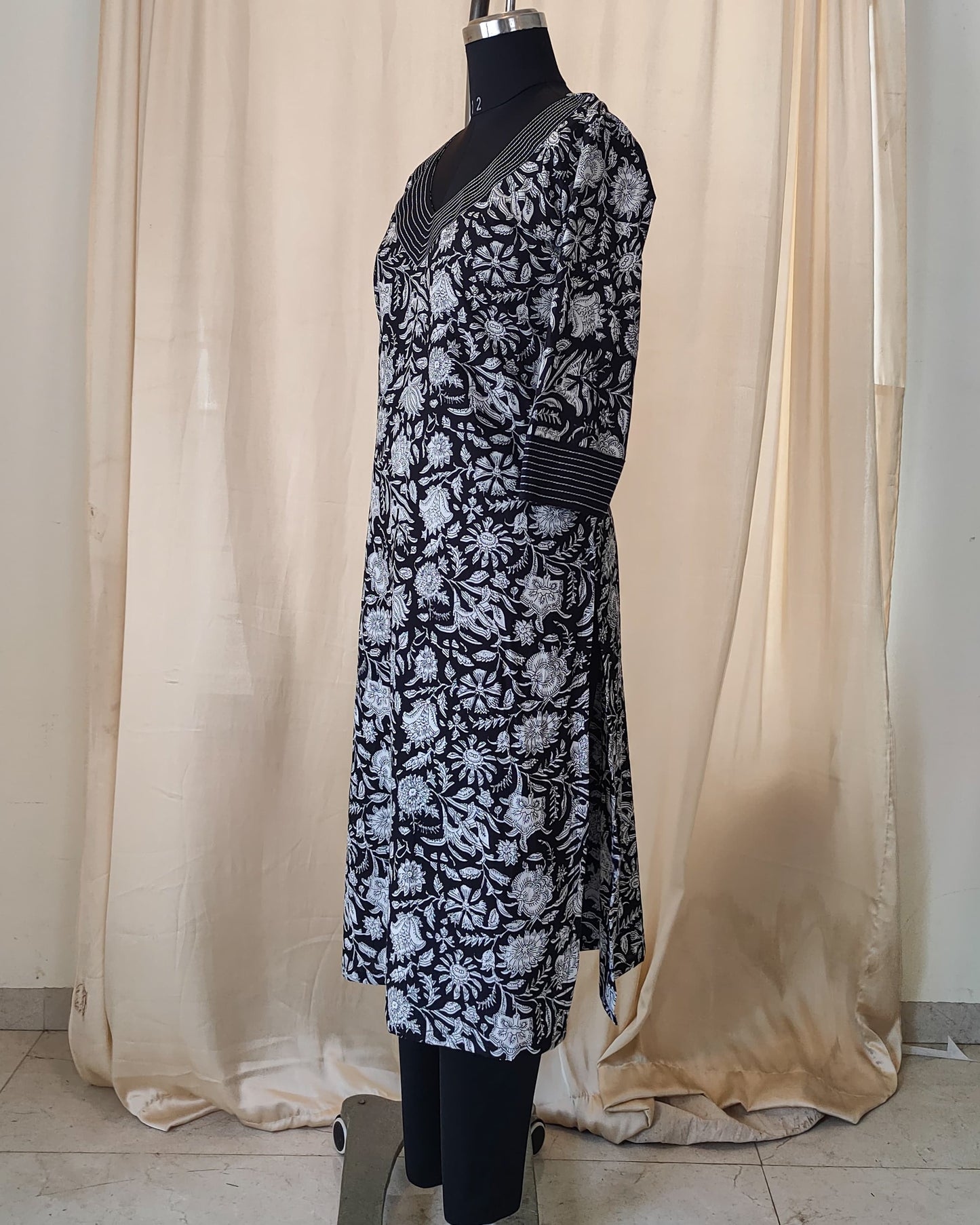 172 Black and white printed kurta with detailing on neck and sleeves