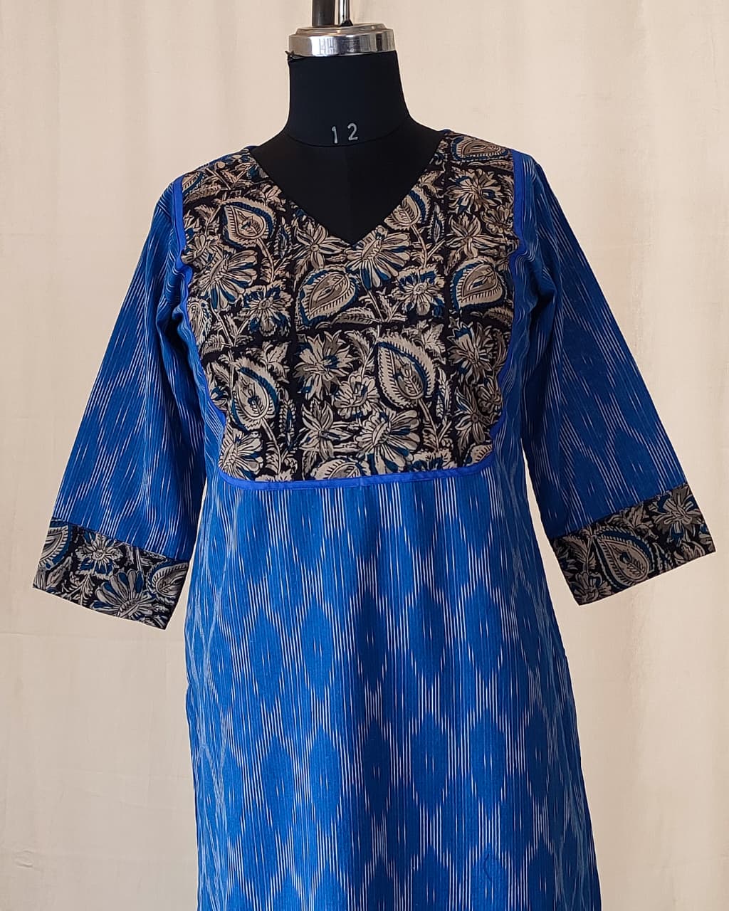 197	Blue ikkat kurta with kalamkari yoke patch