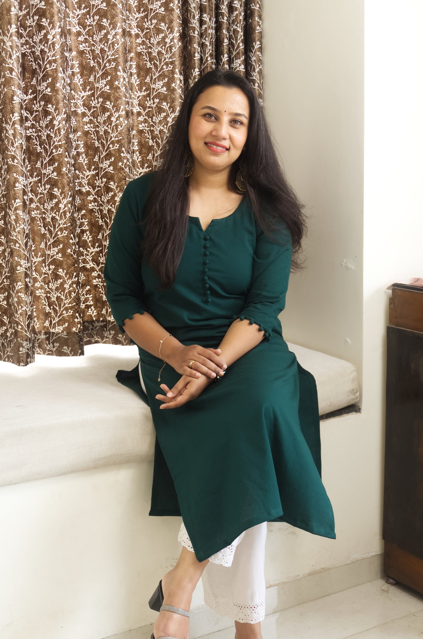 139 Plain Bottle green kurta with potlis