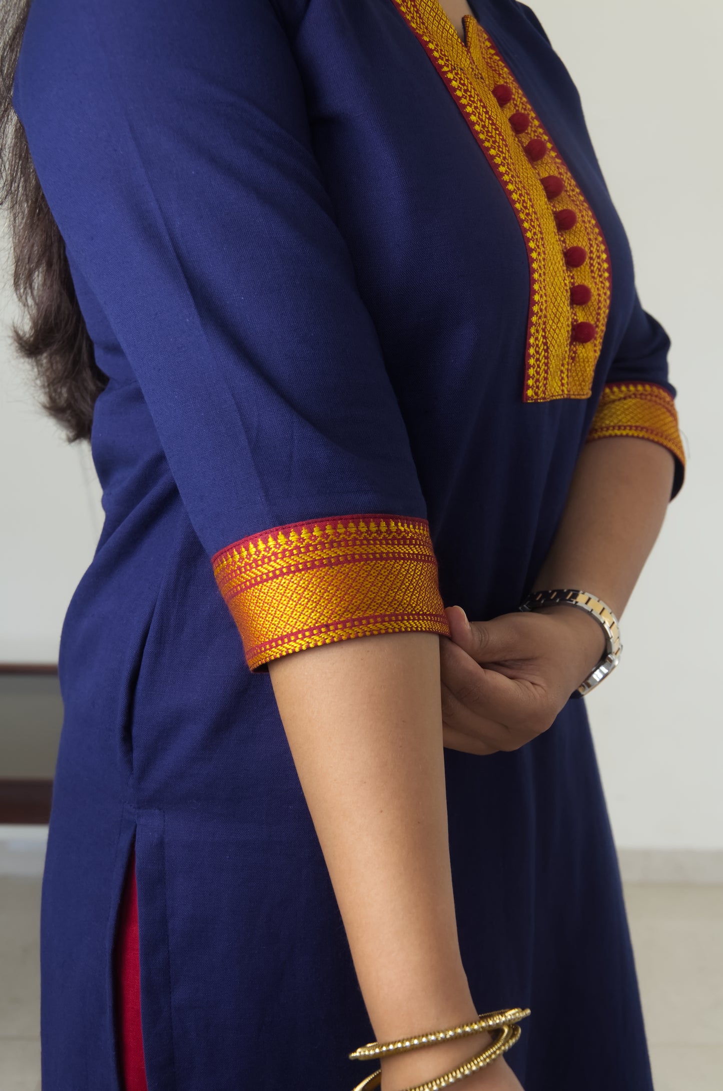 114 Navy Blue Kurta with Khun Border and Red Potlis