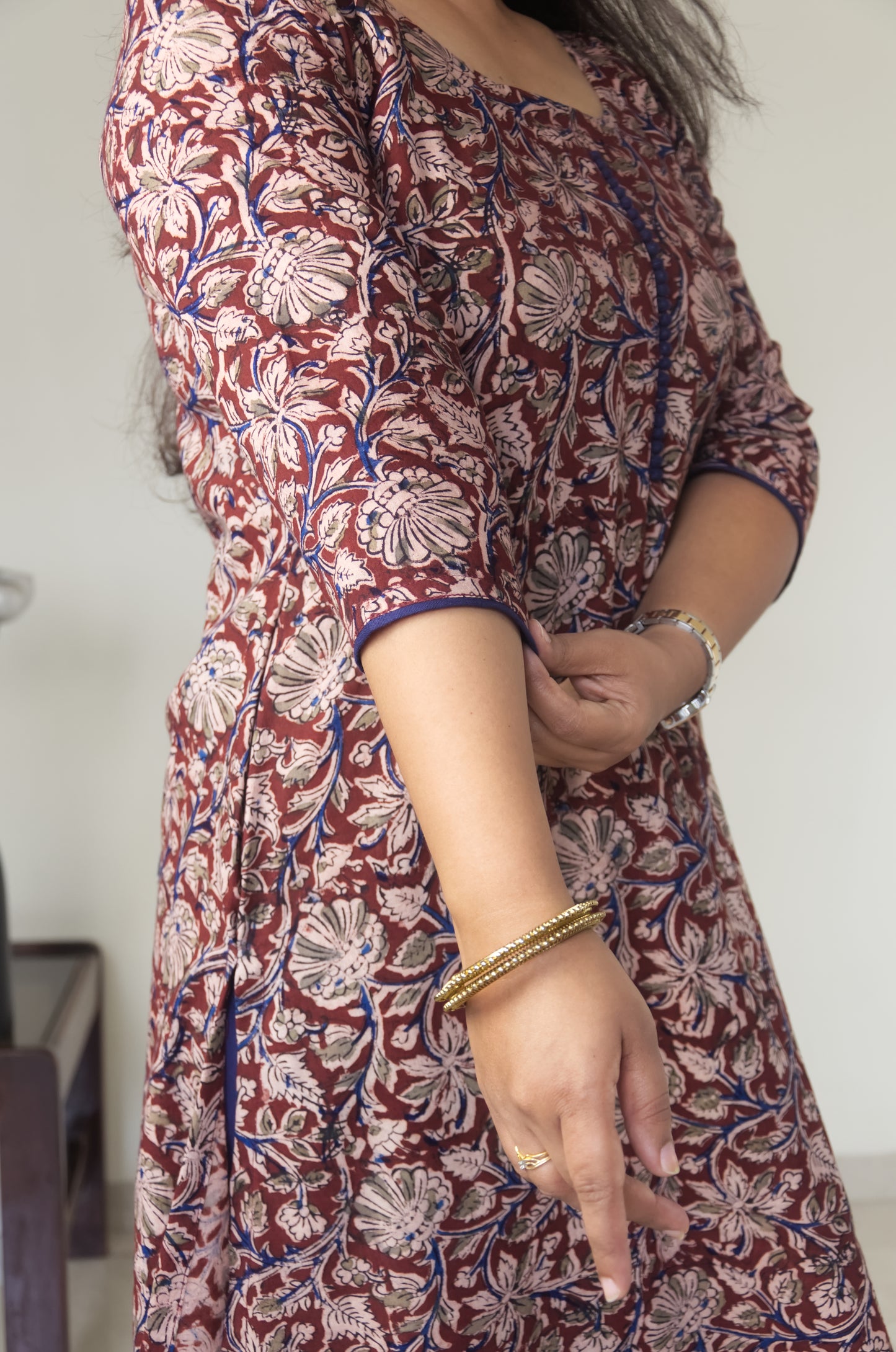 140 A Maroon kalamkari A-line Kurta with blue potlis