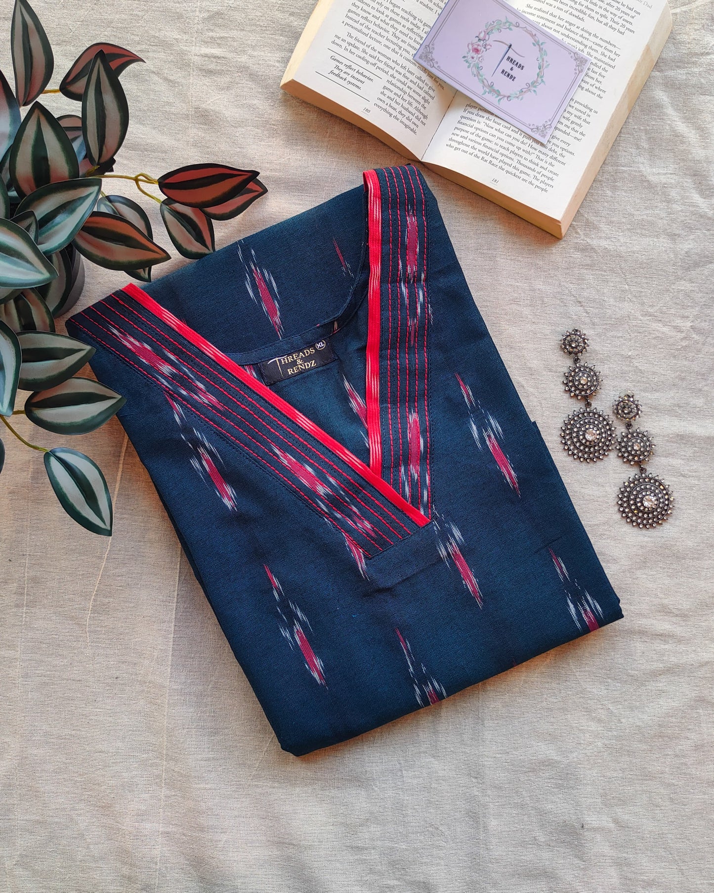 208	Navy blue ikkat kurta with red detailing
