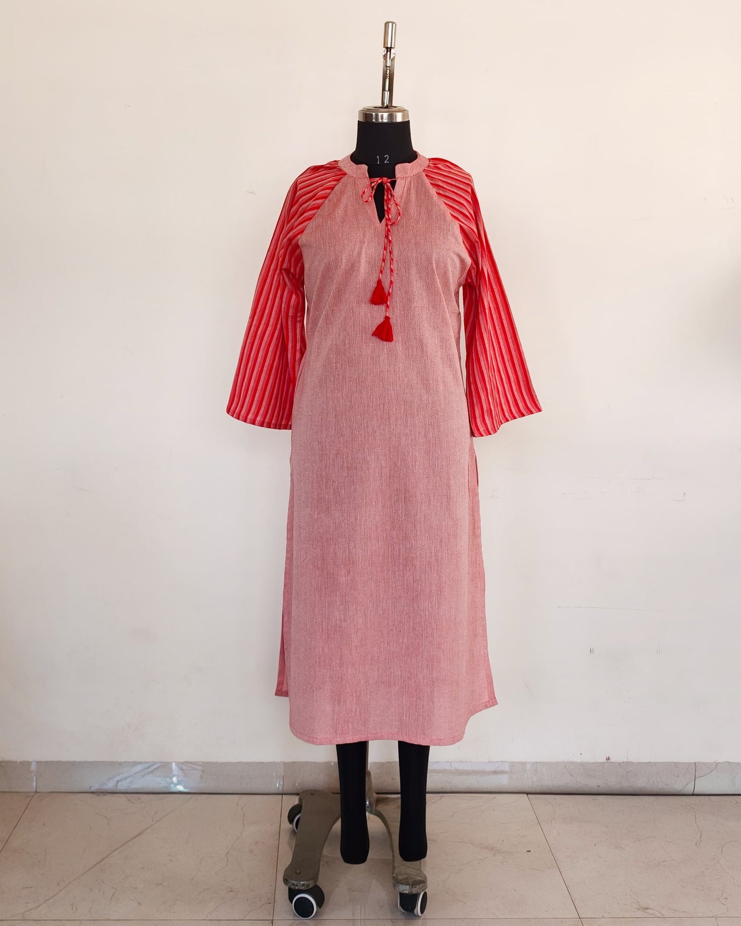 267 Pink with stripes sleeves and tassels