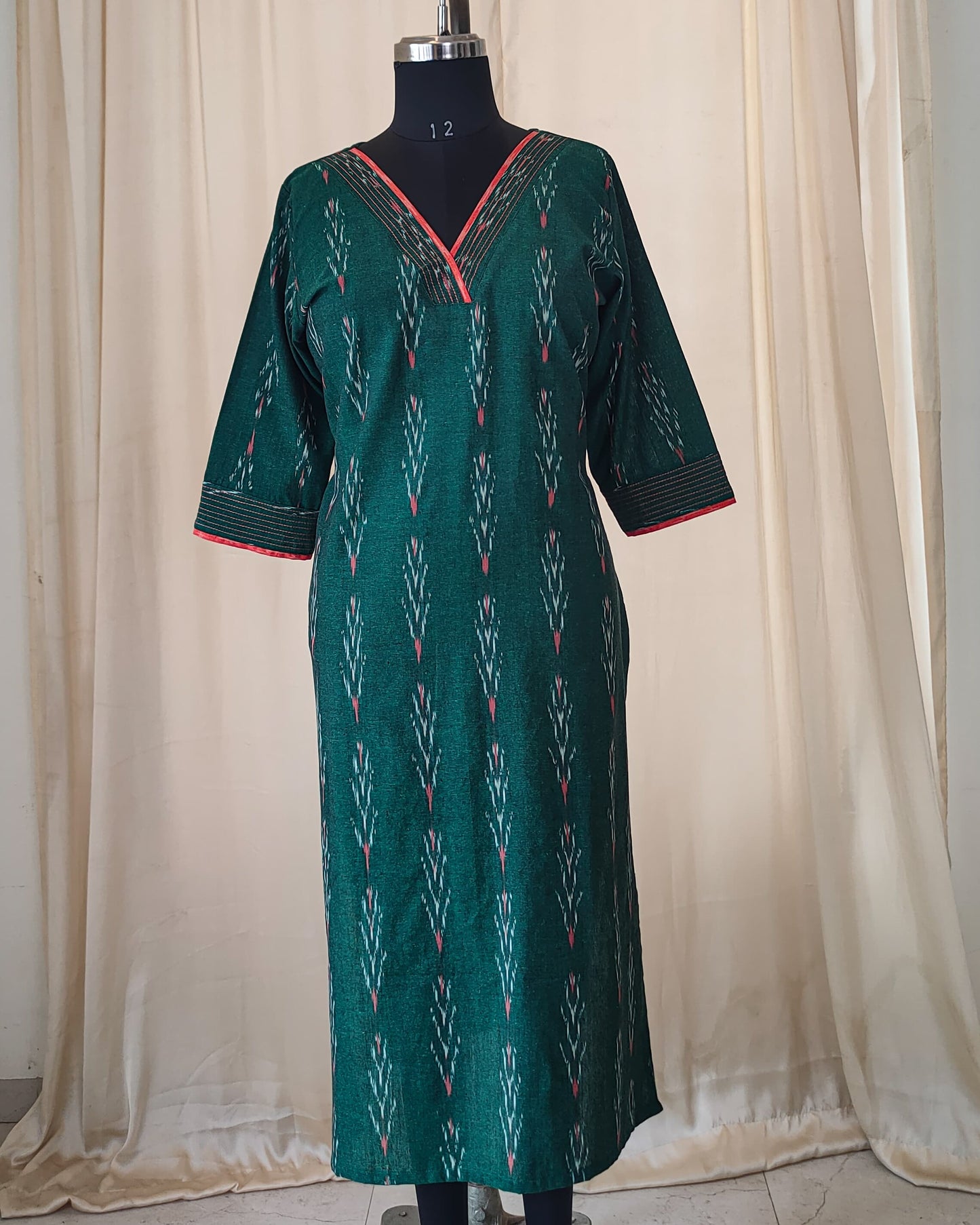154 Bottle green ikkat kurta with orange detailing