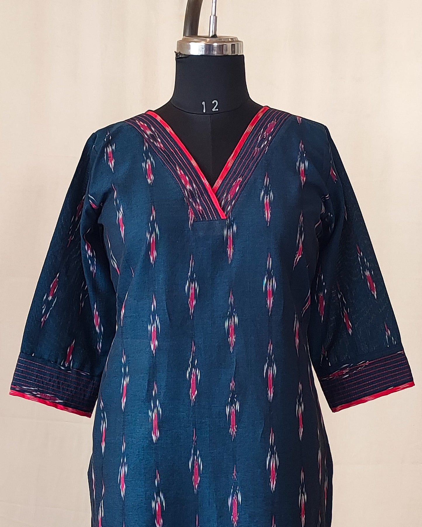 208	Navy blue ikkat kurta with red detailing