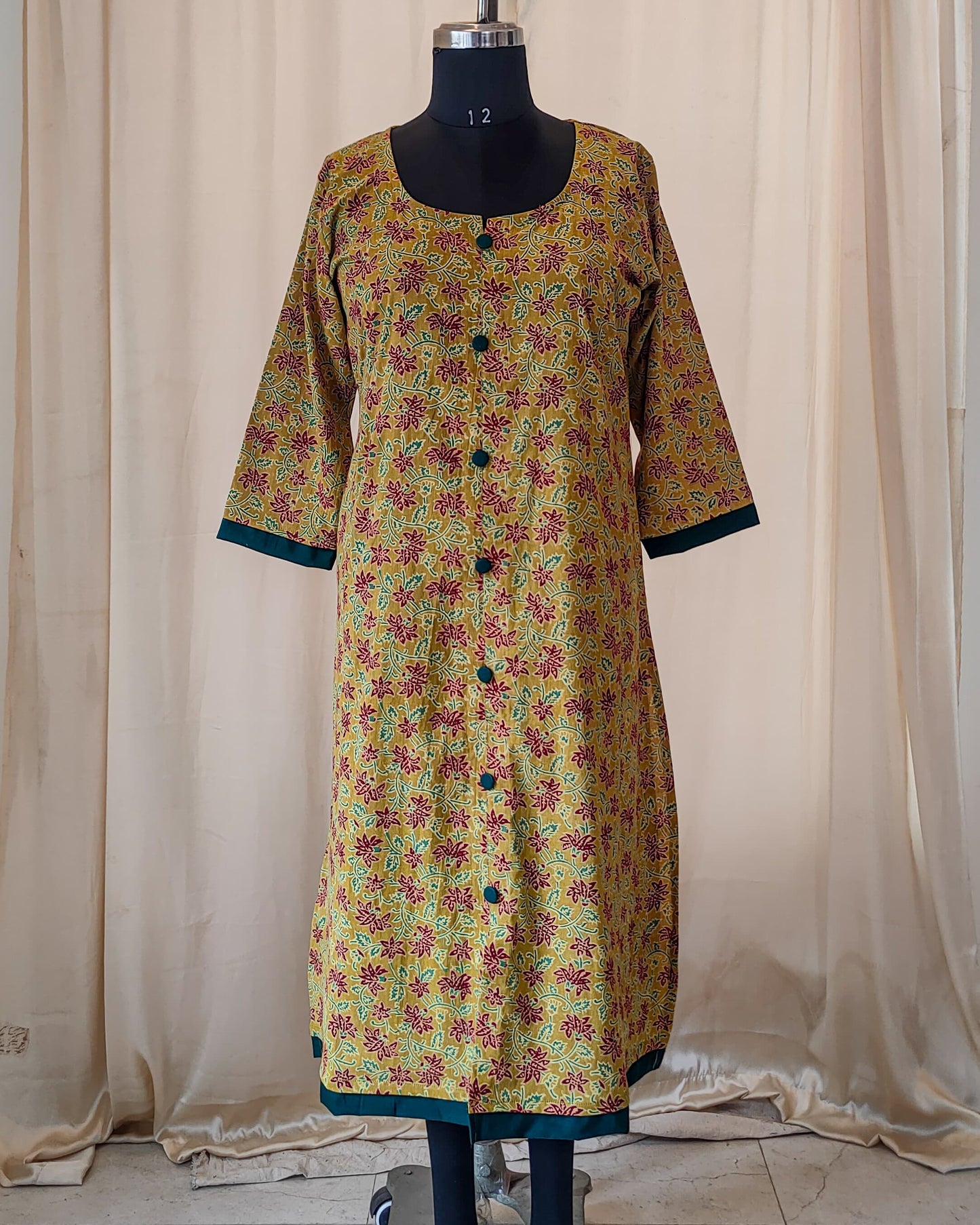 156 Yellow Ajrakh kurta with Green buttons