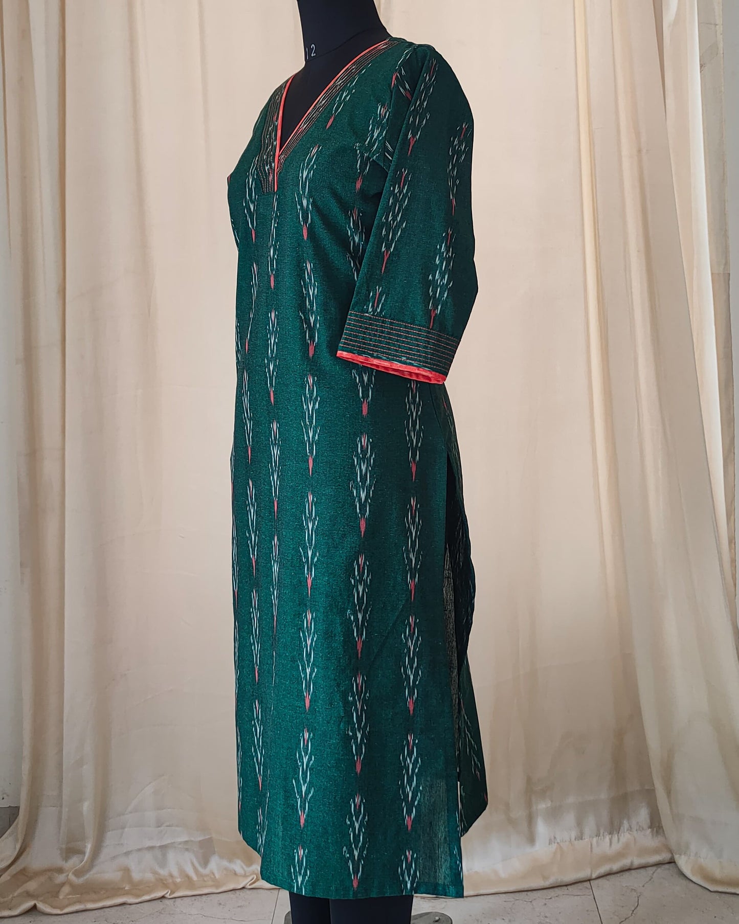 154 Bottle green ikkat kurta with orange detailing