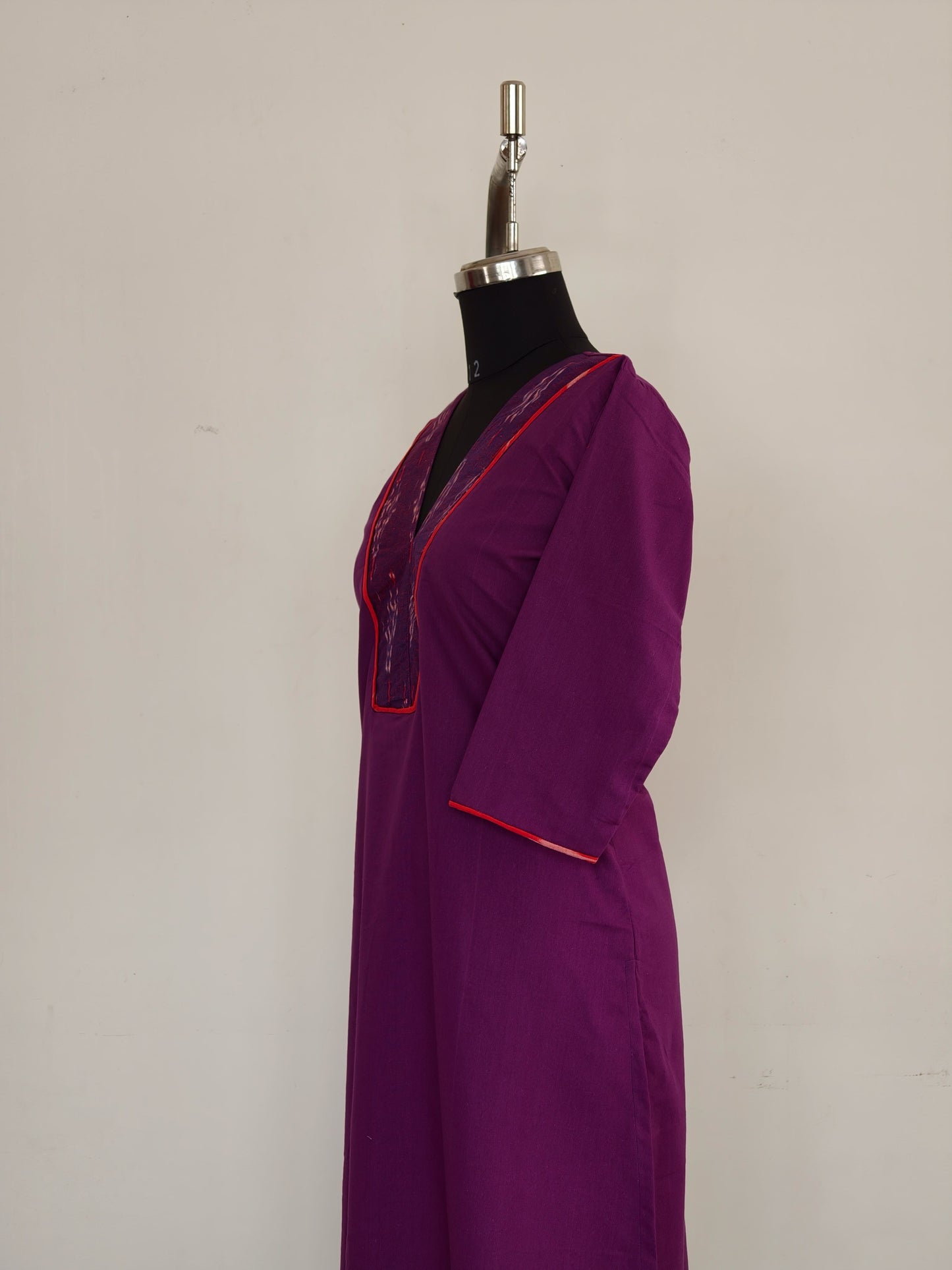 291 Purple with ikkat patch and red piping