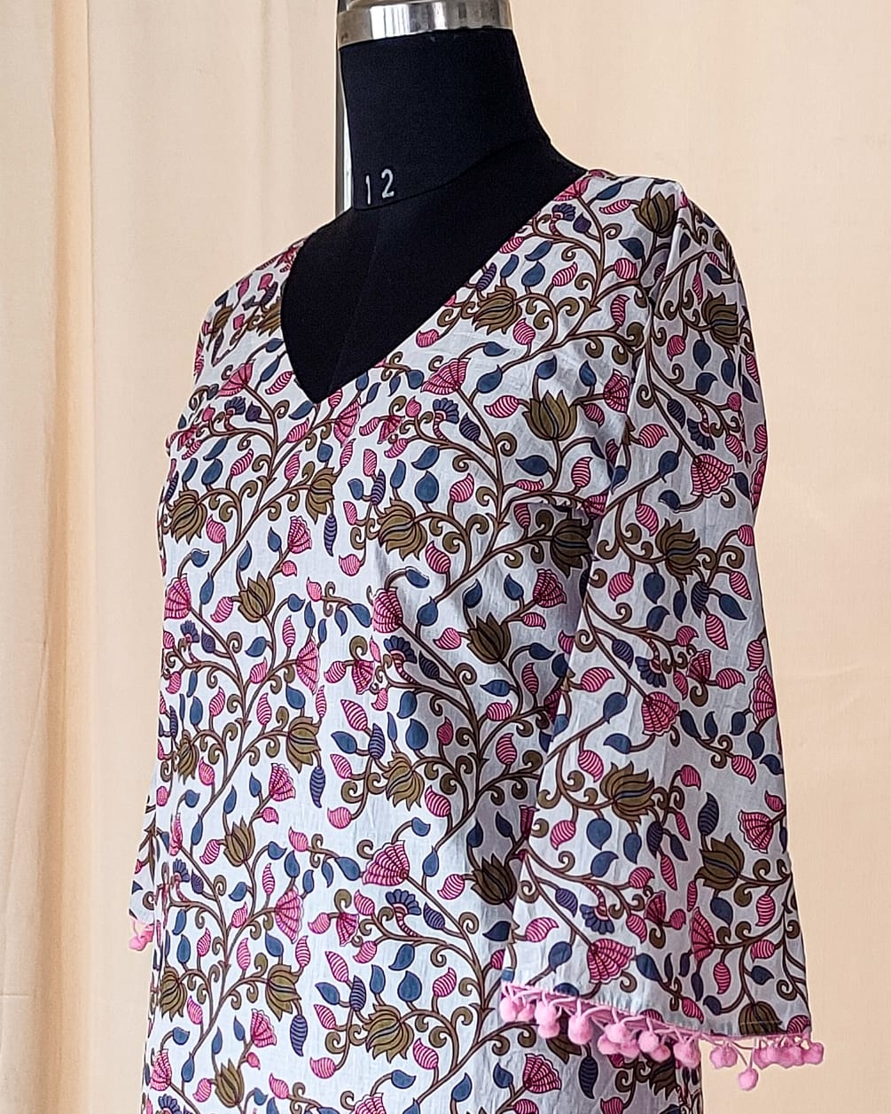 135 White Printed kurta with Pom-pom lace and bell sleeves