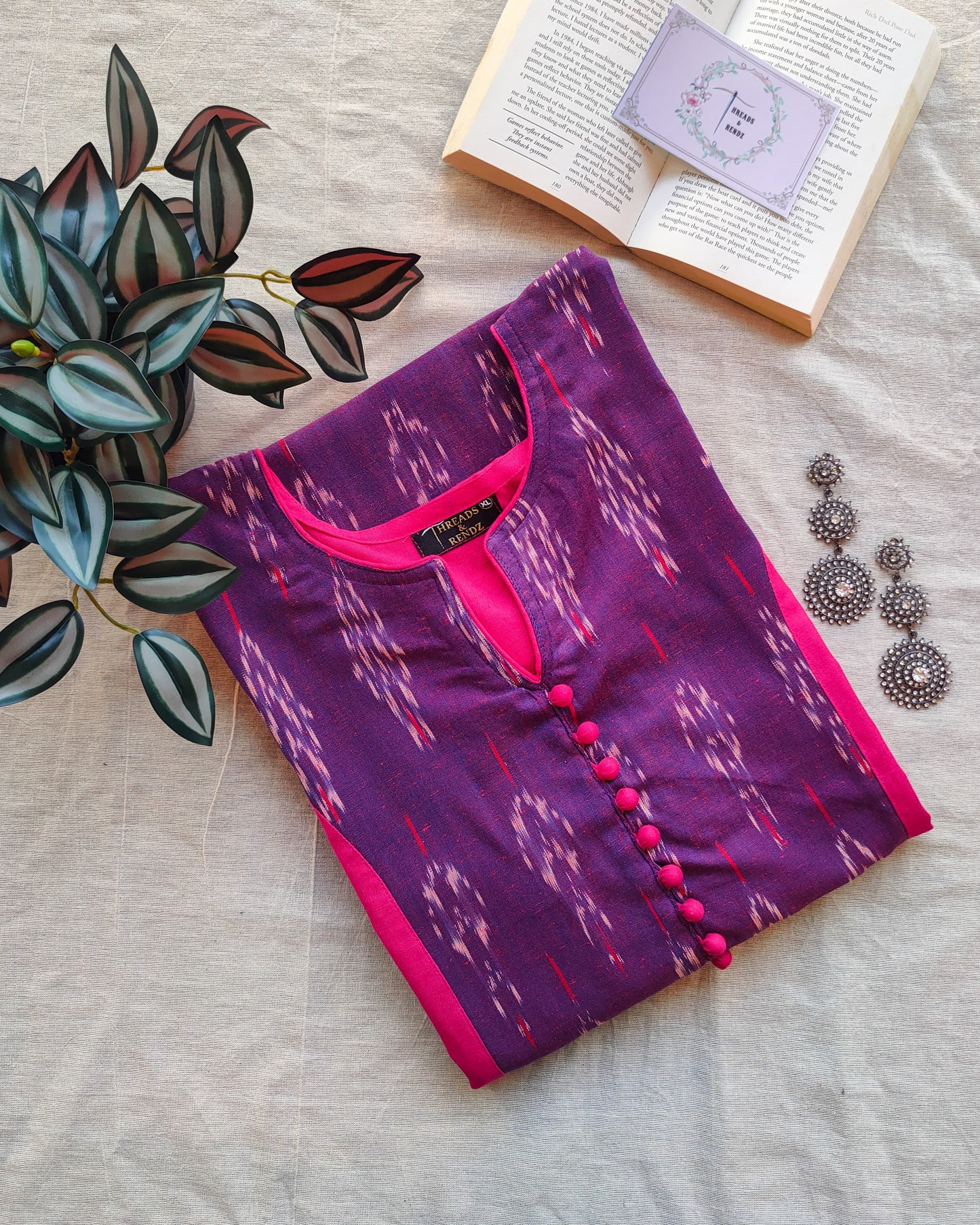 209	Pink n purple ikkat princess cut kurta with potlis