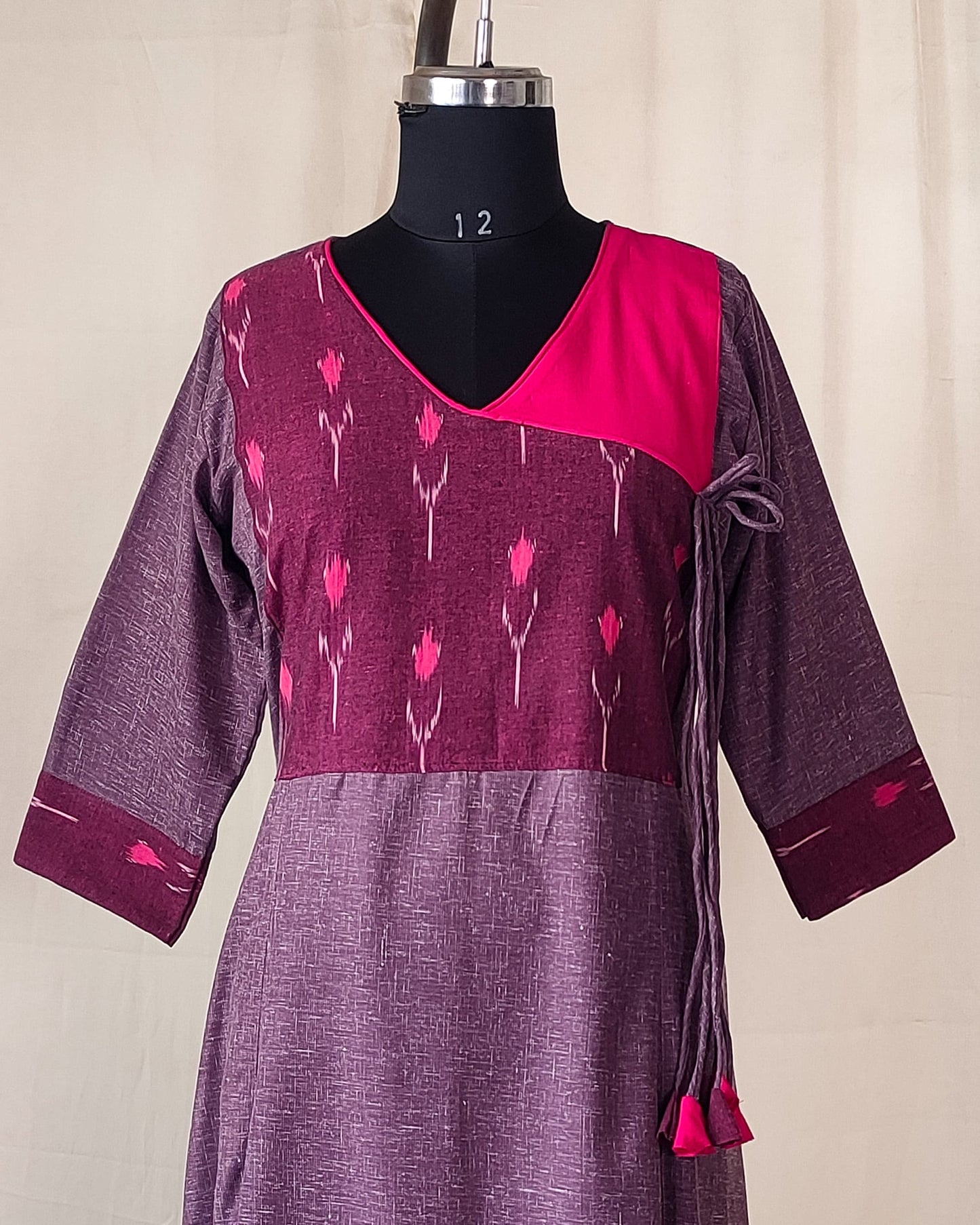 203	Purple soft cotton kurta with ikkat overlap pattern and tassels