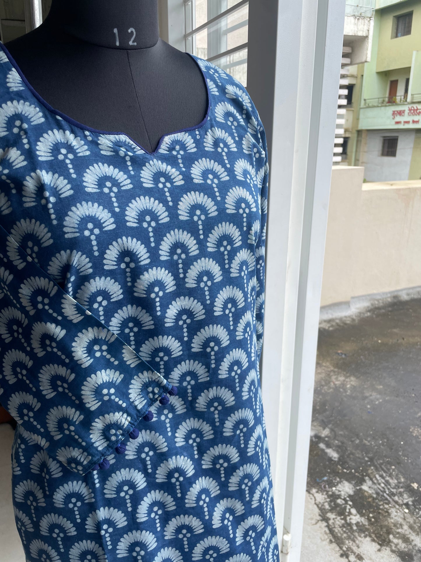 22 Indigo Kurta With Potlis