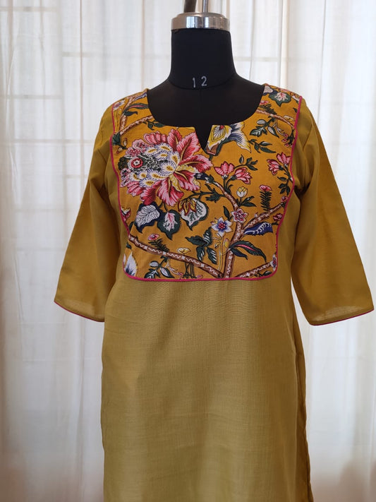 50 Yellow Kurti With Floral Yoke Patch