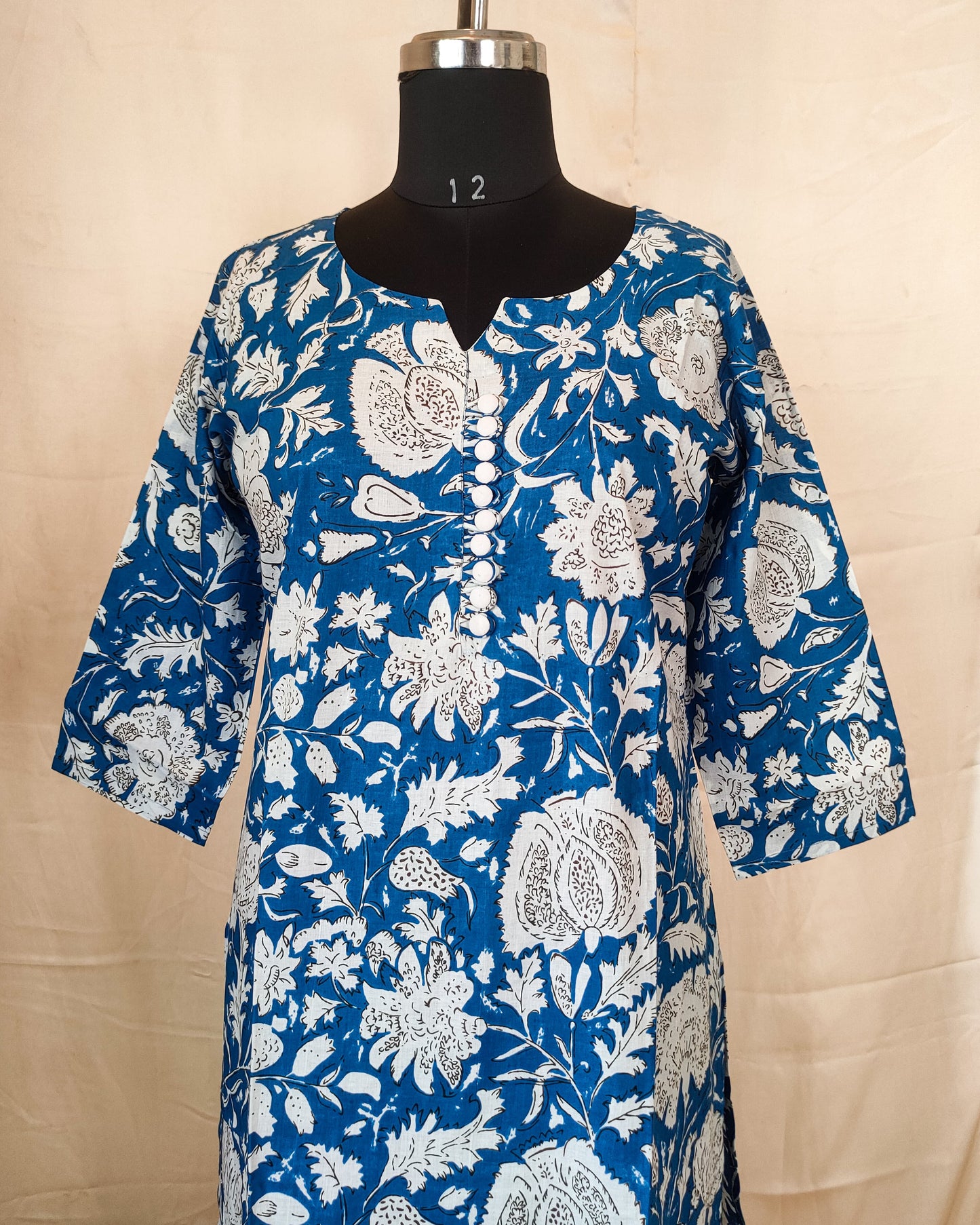 9 A Blue And White Kurta With Buttons