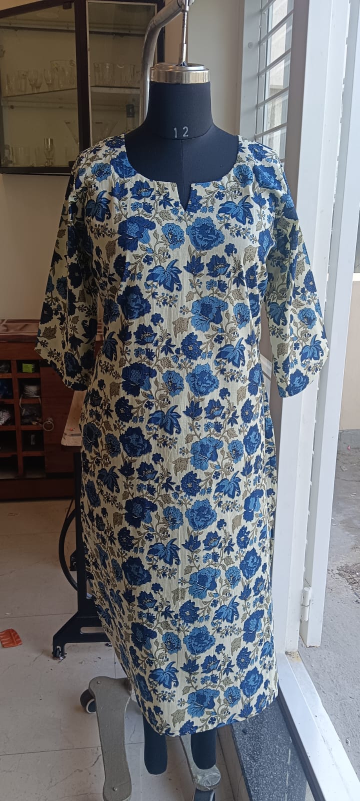 169 Cream And Blue Printed Apple Cut Kurta