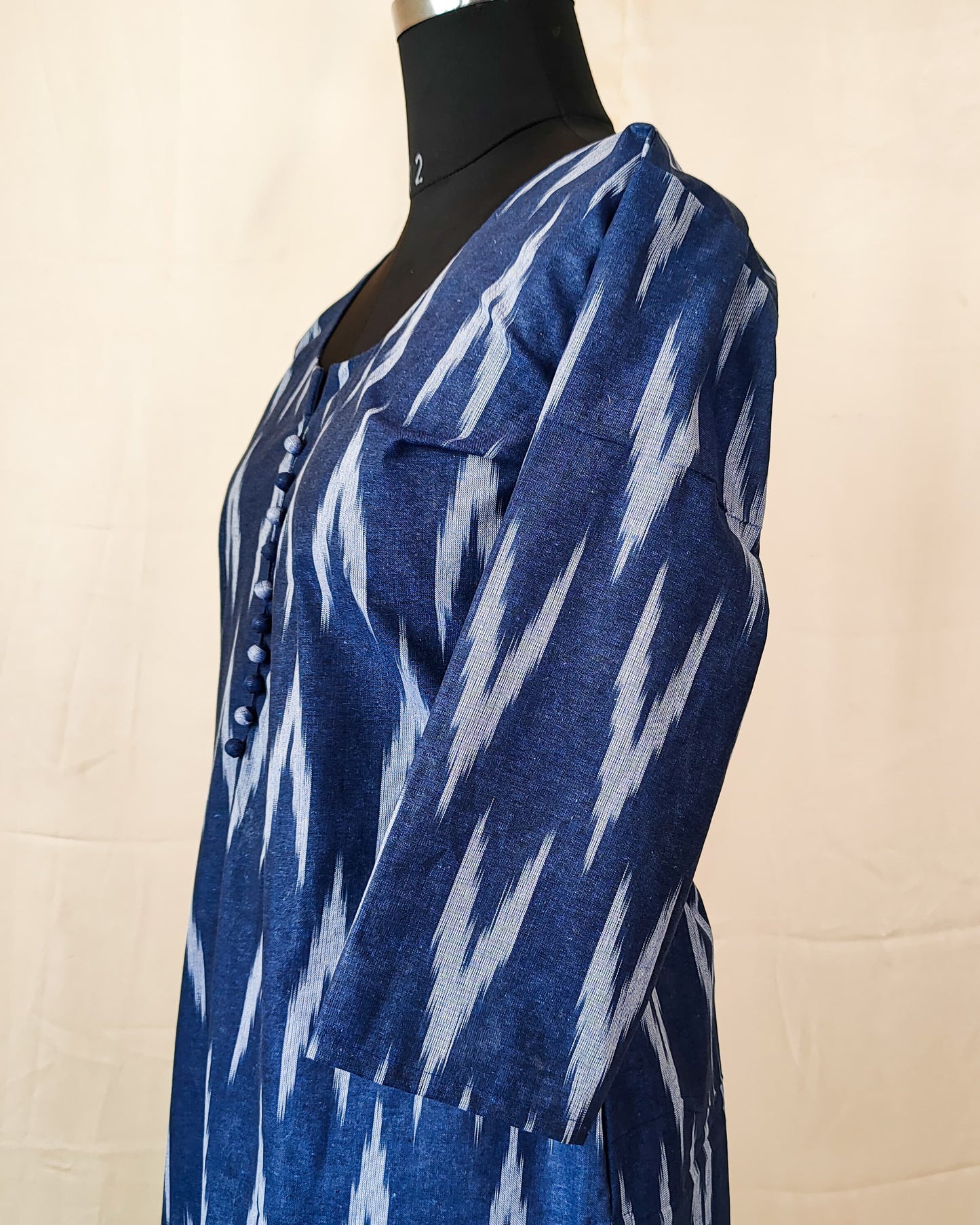 90 A Blue ikkat kurta with potlis