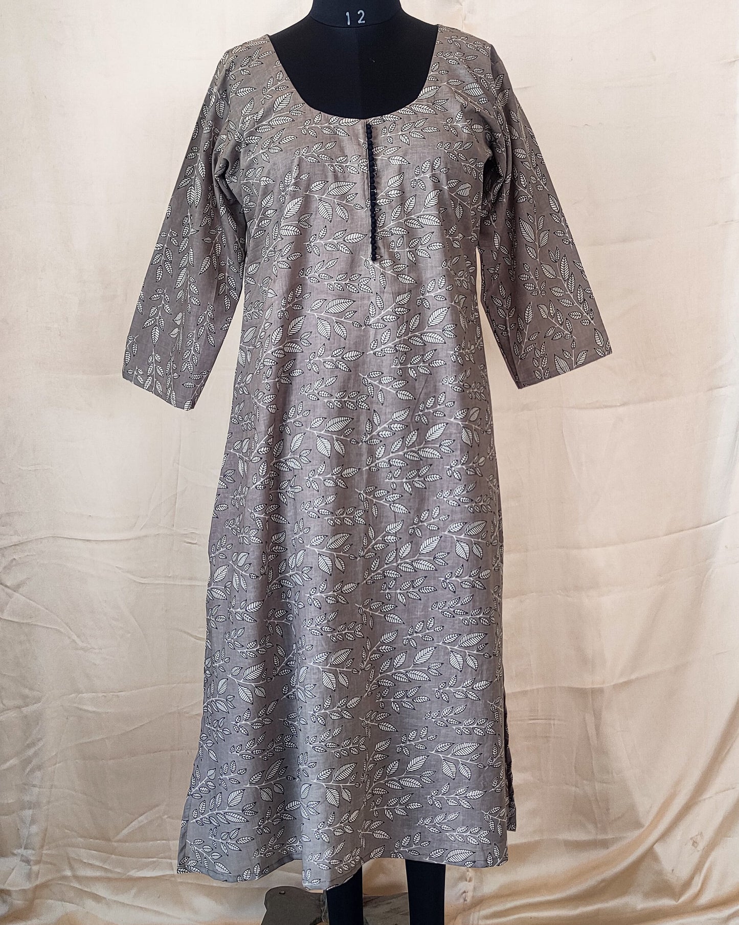 18 A Grey Leaf Print A-Line Kurta With Potlis