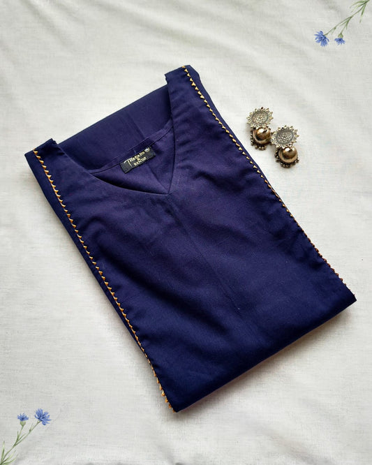 91 A Navy blue A-line kurta with golden lace