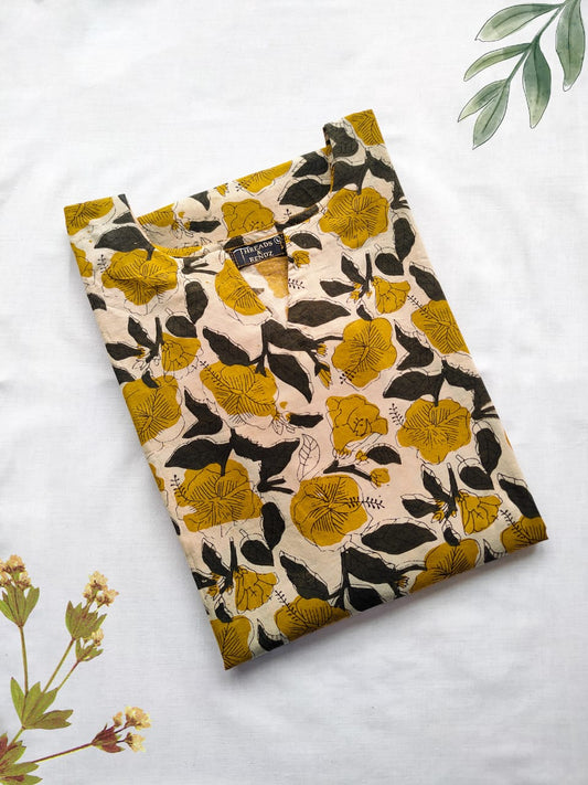 42 Cream And Mustard Printed Cotton Kurti
