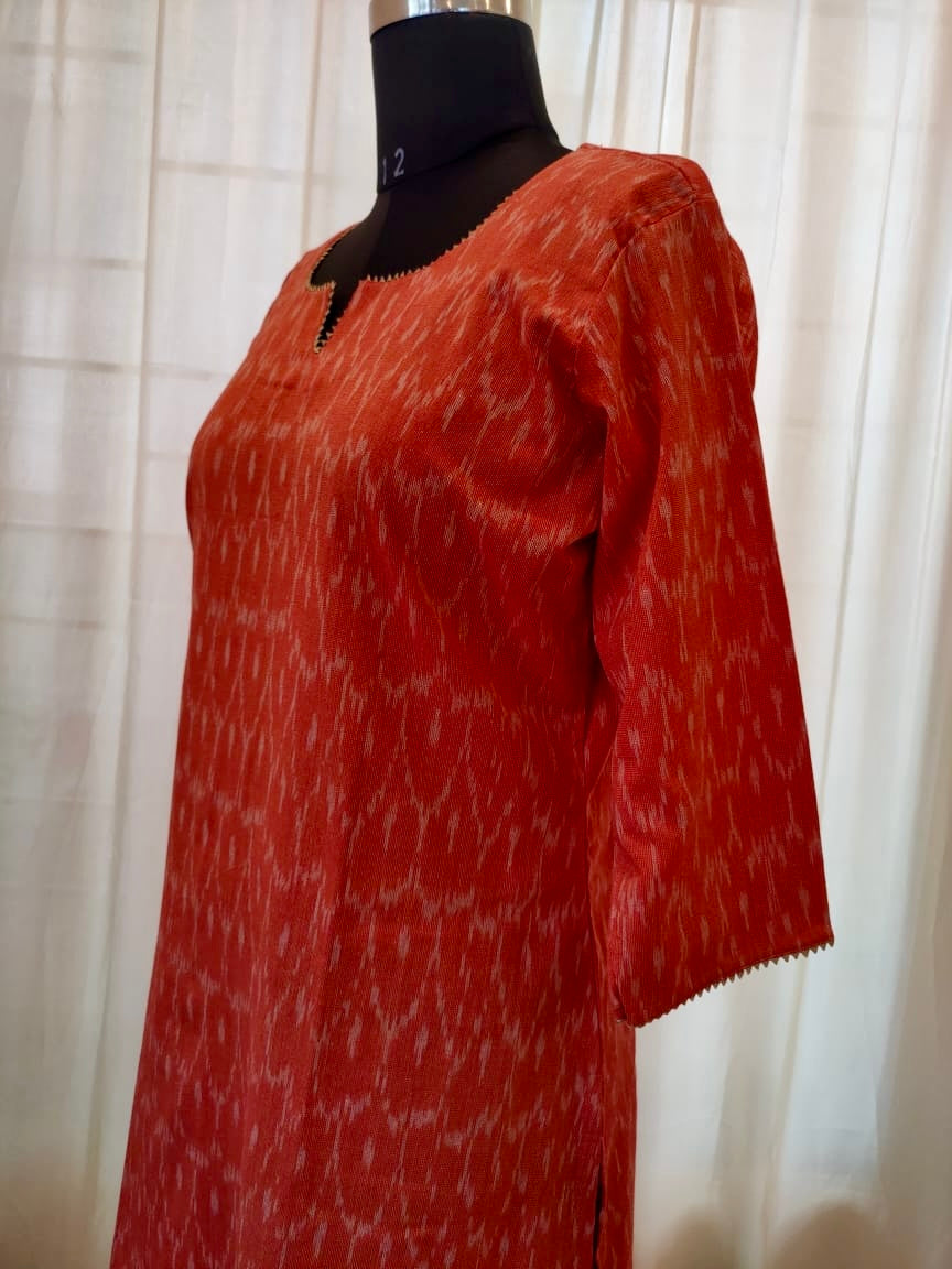 53 Orange Ikkat Kuri With Lace Detailing