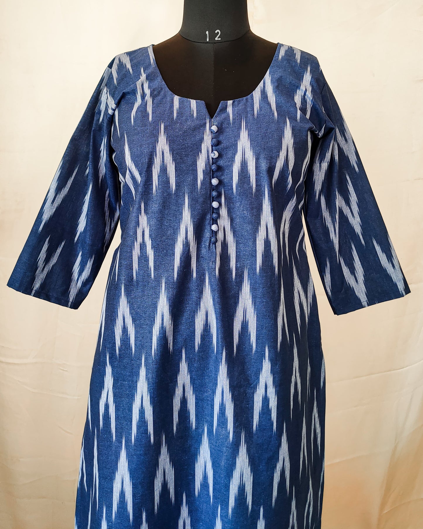 90 A Blue ikkat kurta with potlis