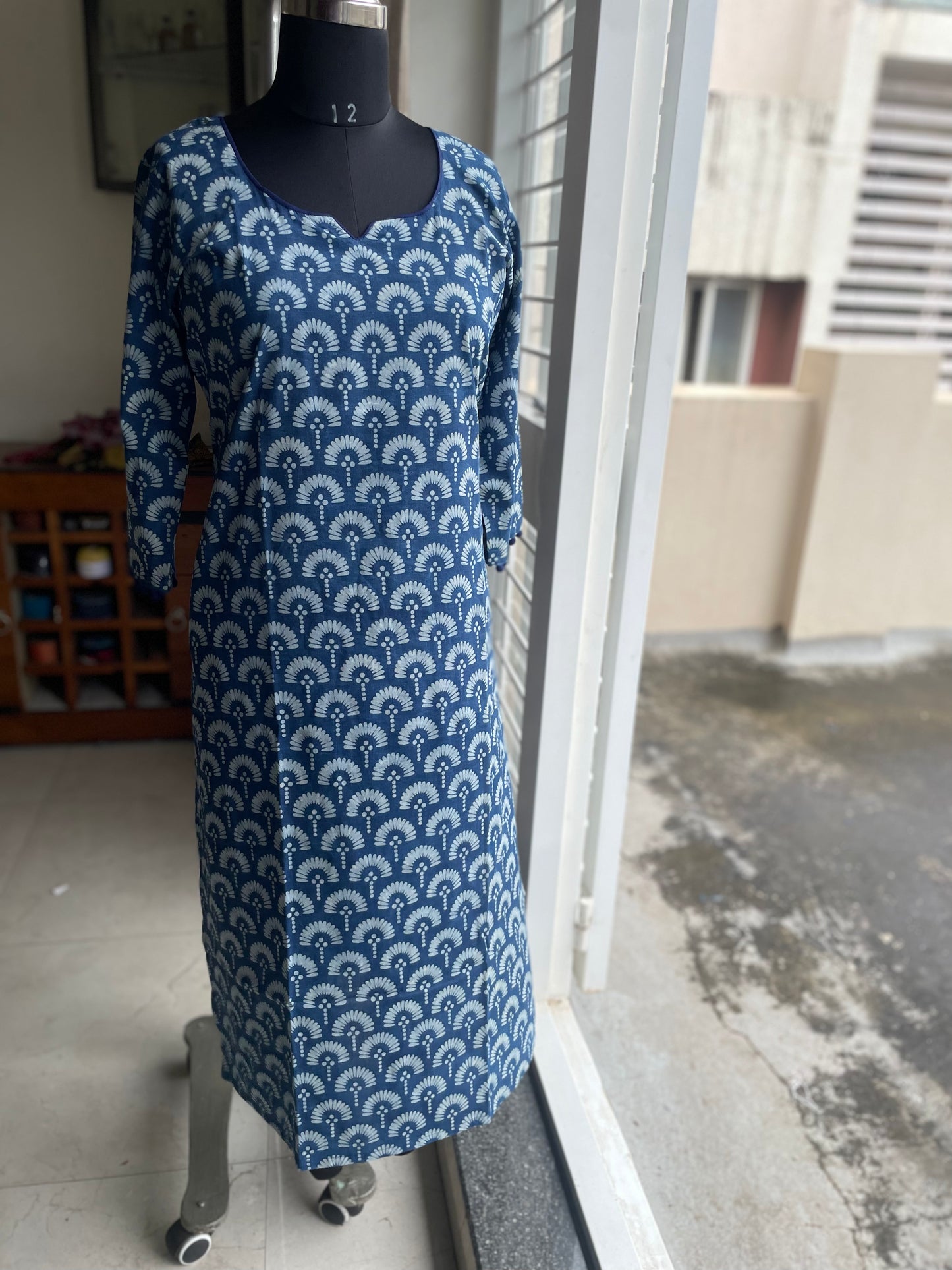 22 Indigo Kurta With Potlis